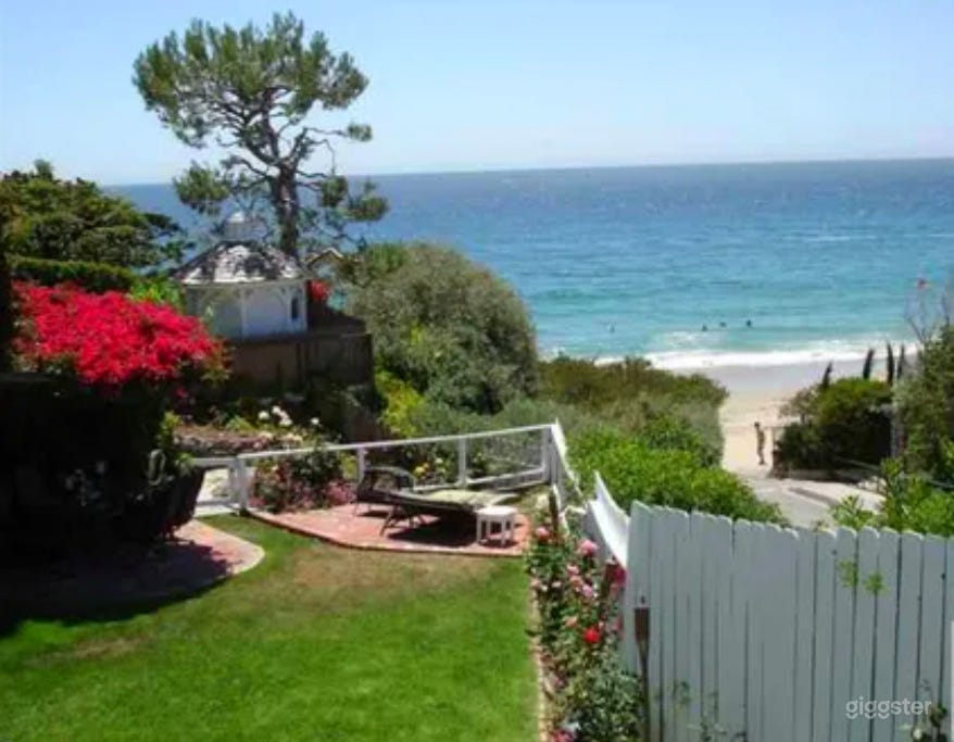 Stunning 3 Level Ocean View Beach Home on the Sand Photo 3