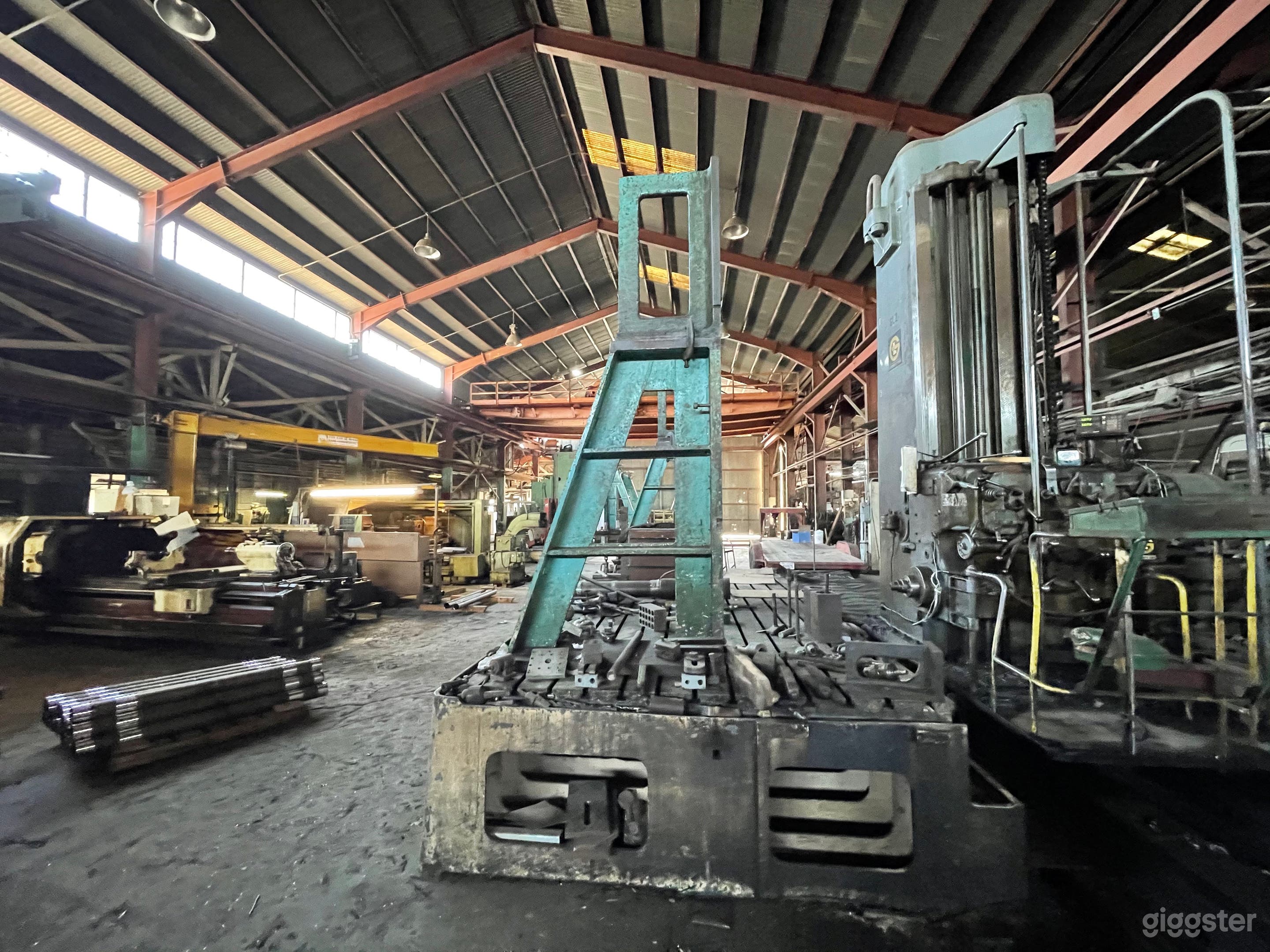 Massive Metal Shop Warehouse with Heavy Machinery Photo 4