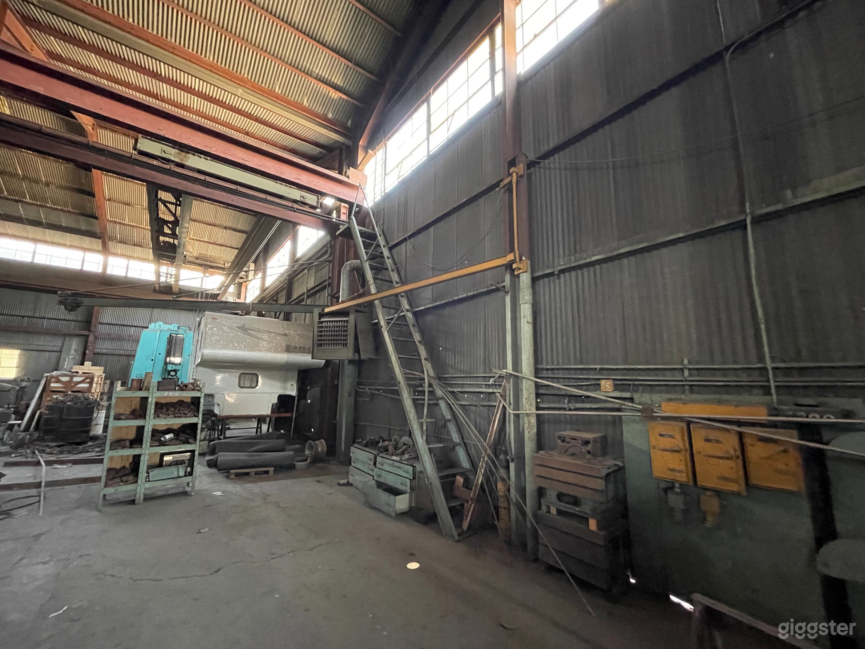 Massive Metal Shop Warehouse with Heavy Machinery Photo 3