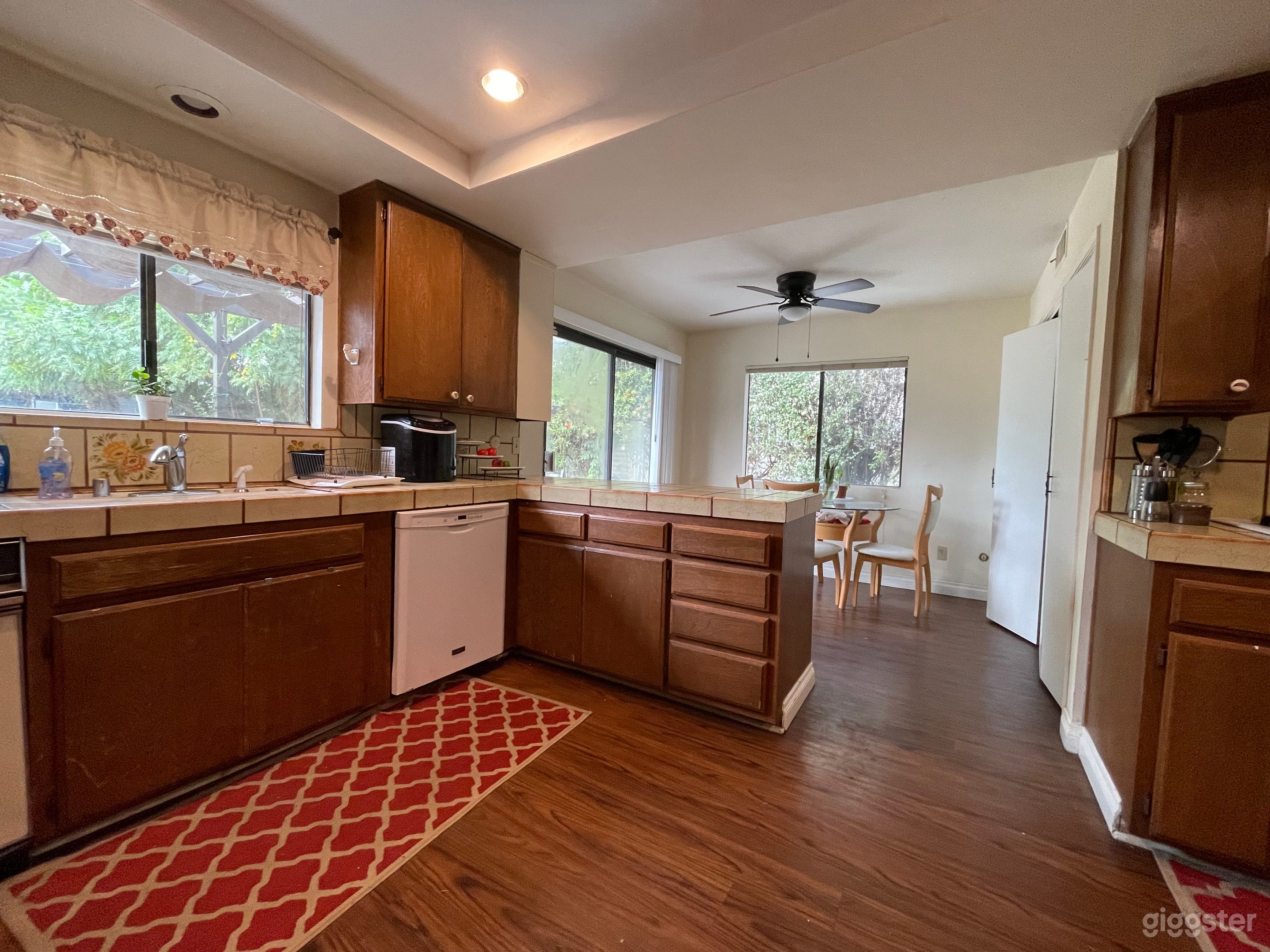 Charming 80’s Kitchen! Wood cabinets, tile countertops and range hood! Photo 2