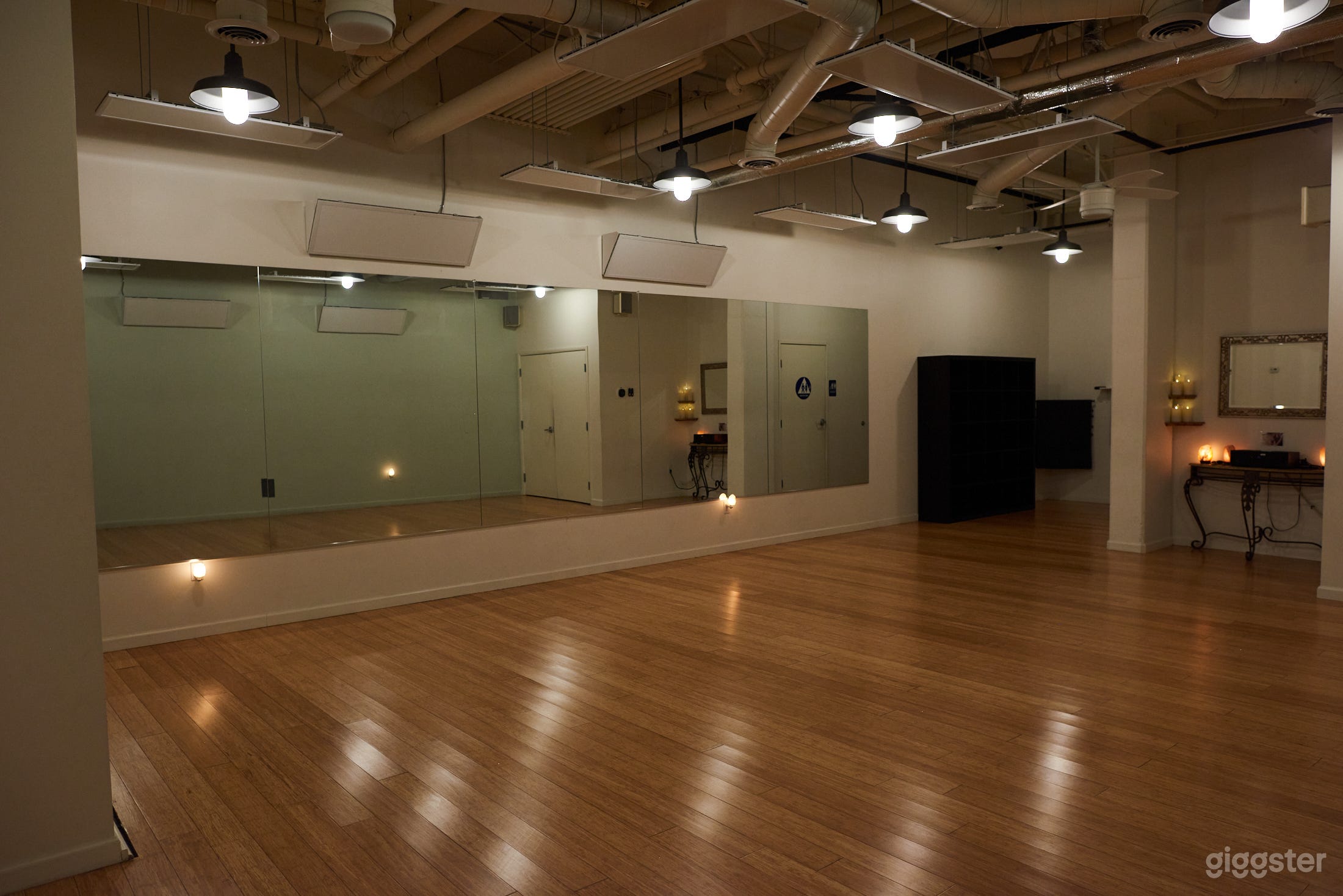 Ganesh Room: $75 an hour ) provides, walled mirrors, Far Infrared Hot Panels (far infrared heat is anti-bacterial, hardwood floors, great sound system, high ceilings, private bathroom and entrance to the parking garage (perfect for celebrity clients).