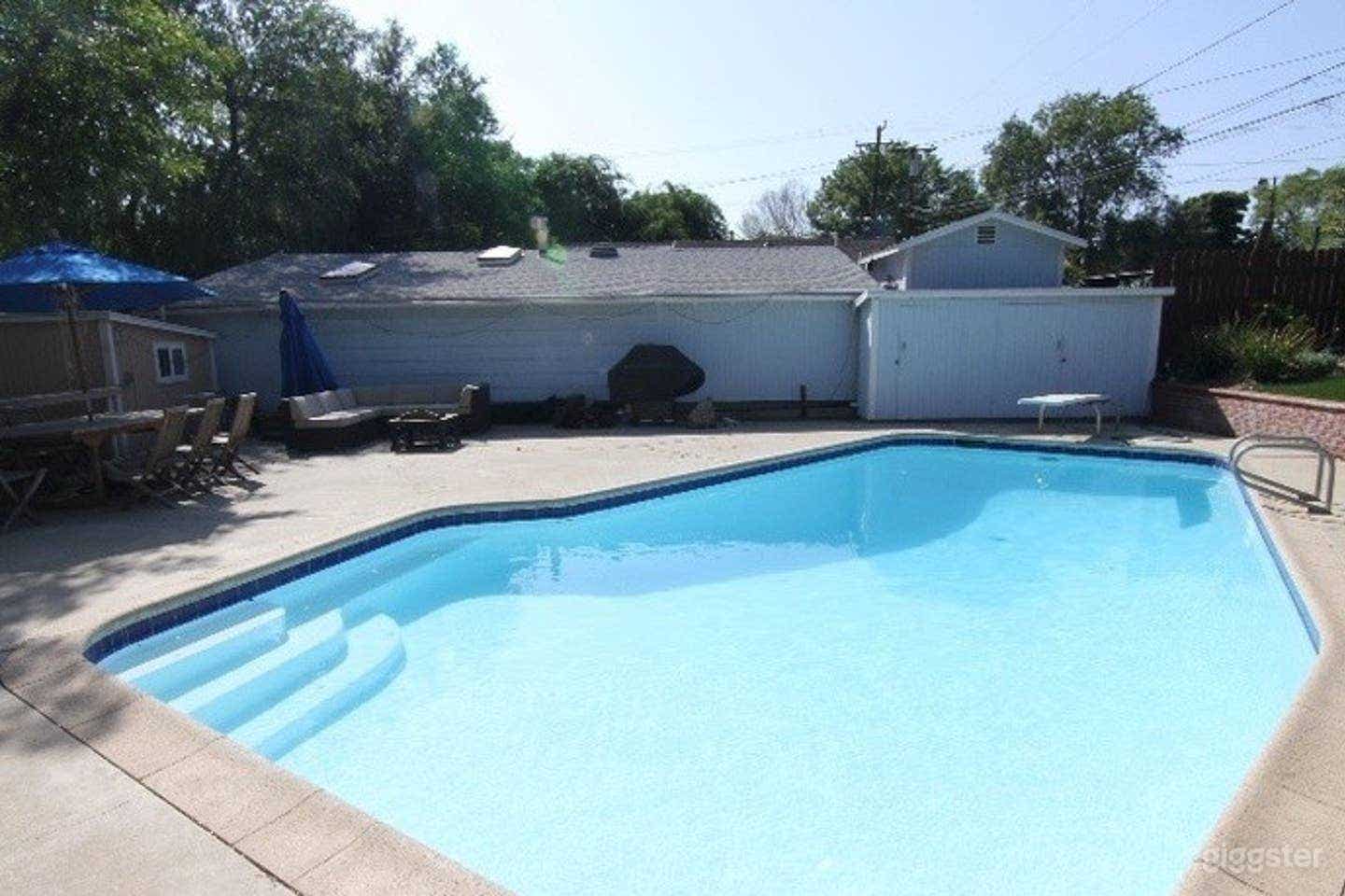 Large pool, diving board, pool lounge, pool area, 