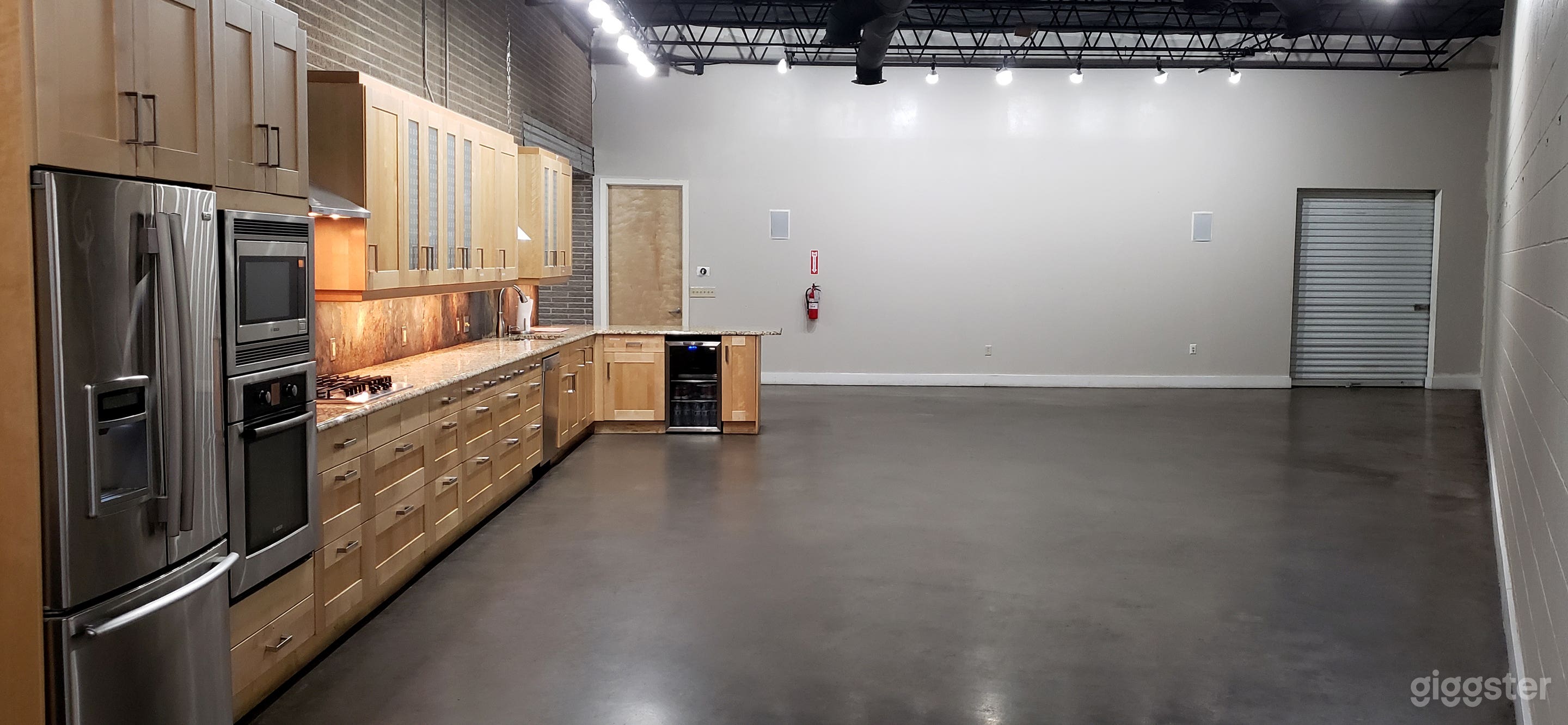 The Kitchen with Outdoor Deck Photo 2