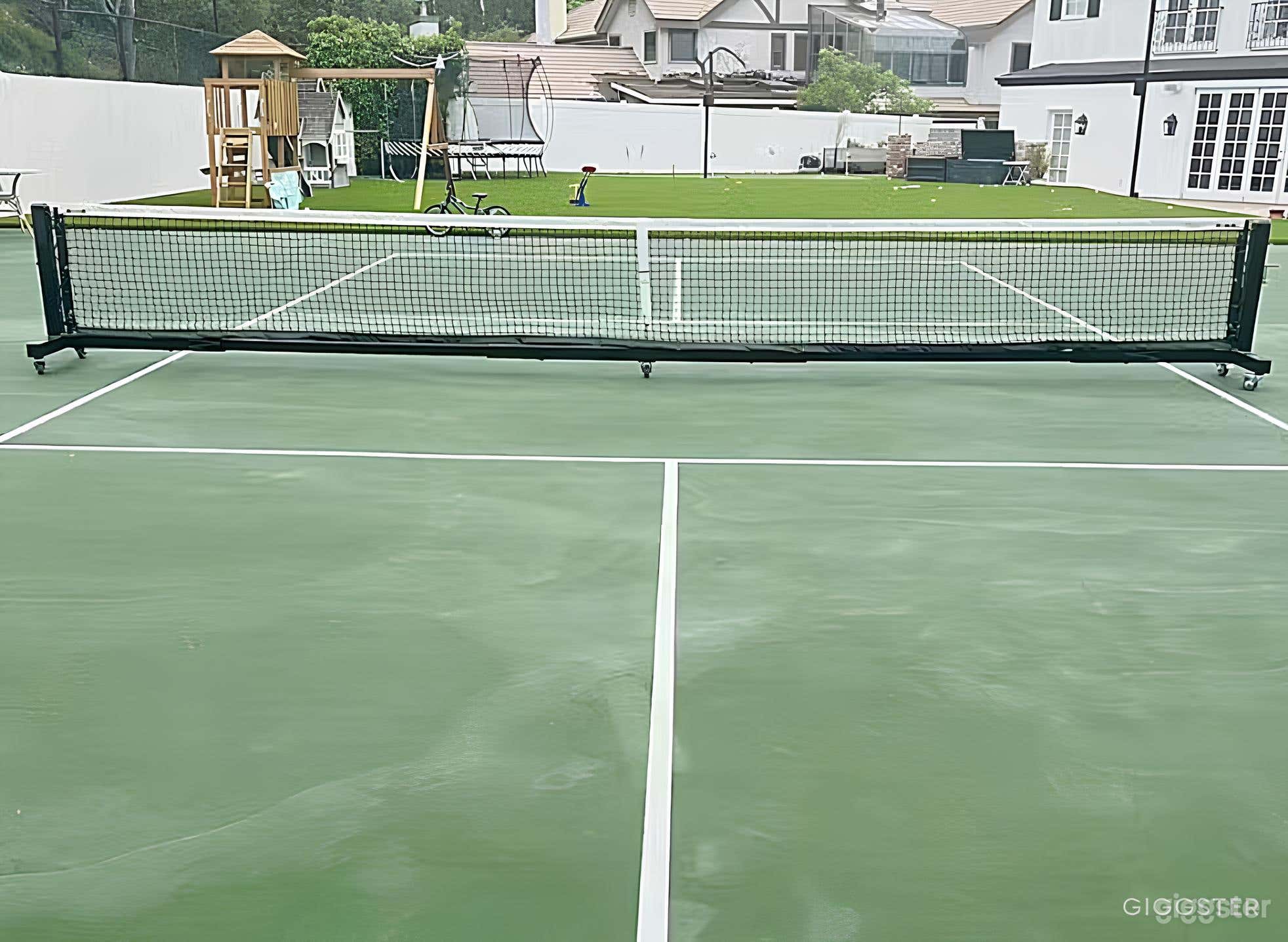 Pickleball Court amidst Verdant Settings Photo 3