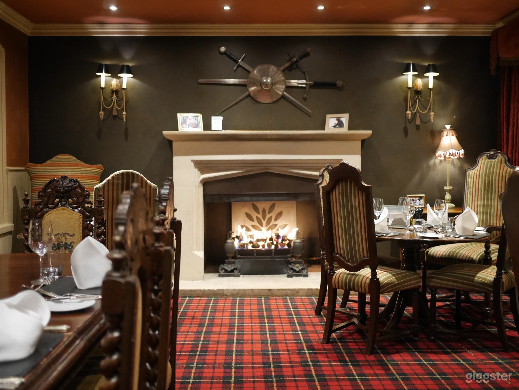 Our Garden Room has a great fireplace, tartan flooring and a high ceiling