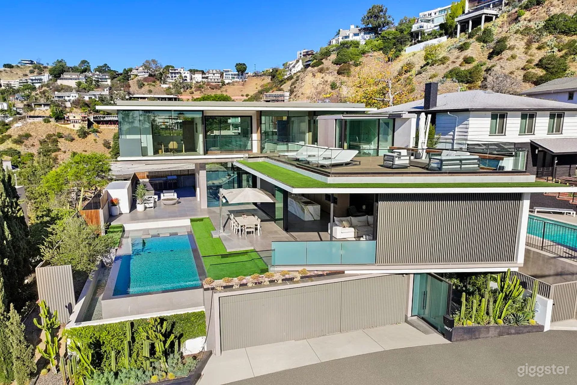 Contemporary Hillside Cinema House Photo 2