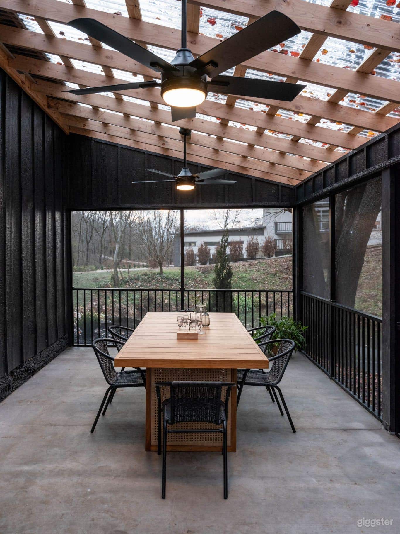 Outdoor screened in porch, overlooking the creek, stream, pond area. Seats 8