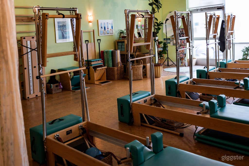 6 reformer/towers, one Cadillac, 4 Pilates chairs, a large barrel and 4 CoreAlign pieces of Pilates equipment.
