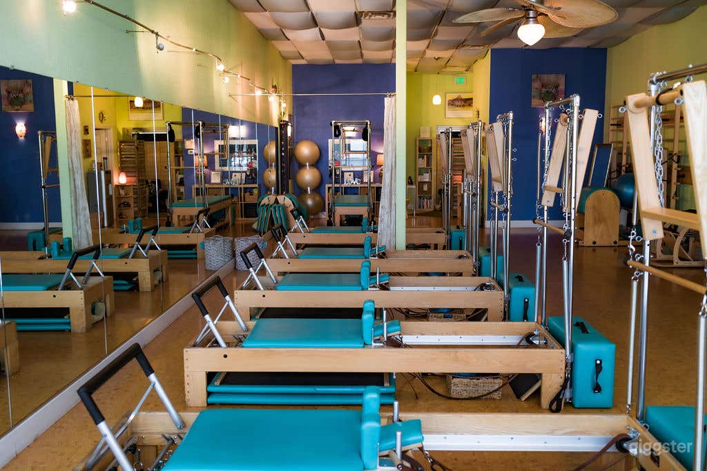 Interior view facing the back of the studio.  Lovely light green, turquoise and blue hues.