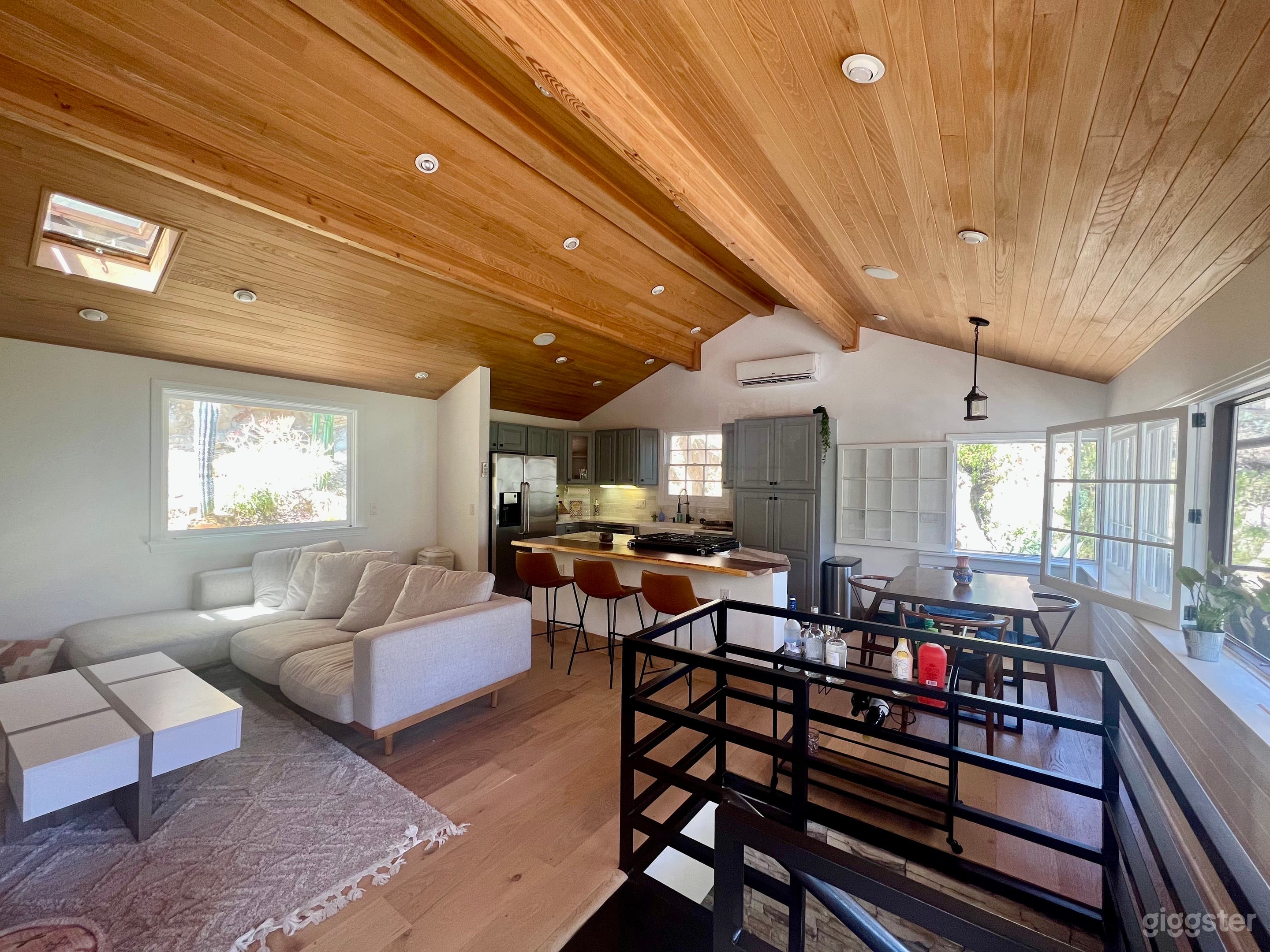 Staircase from first floor, living room, kitchen, dining room open space