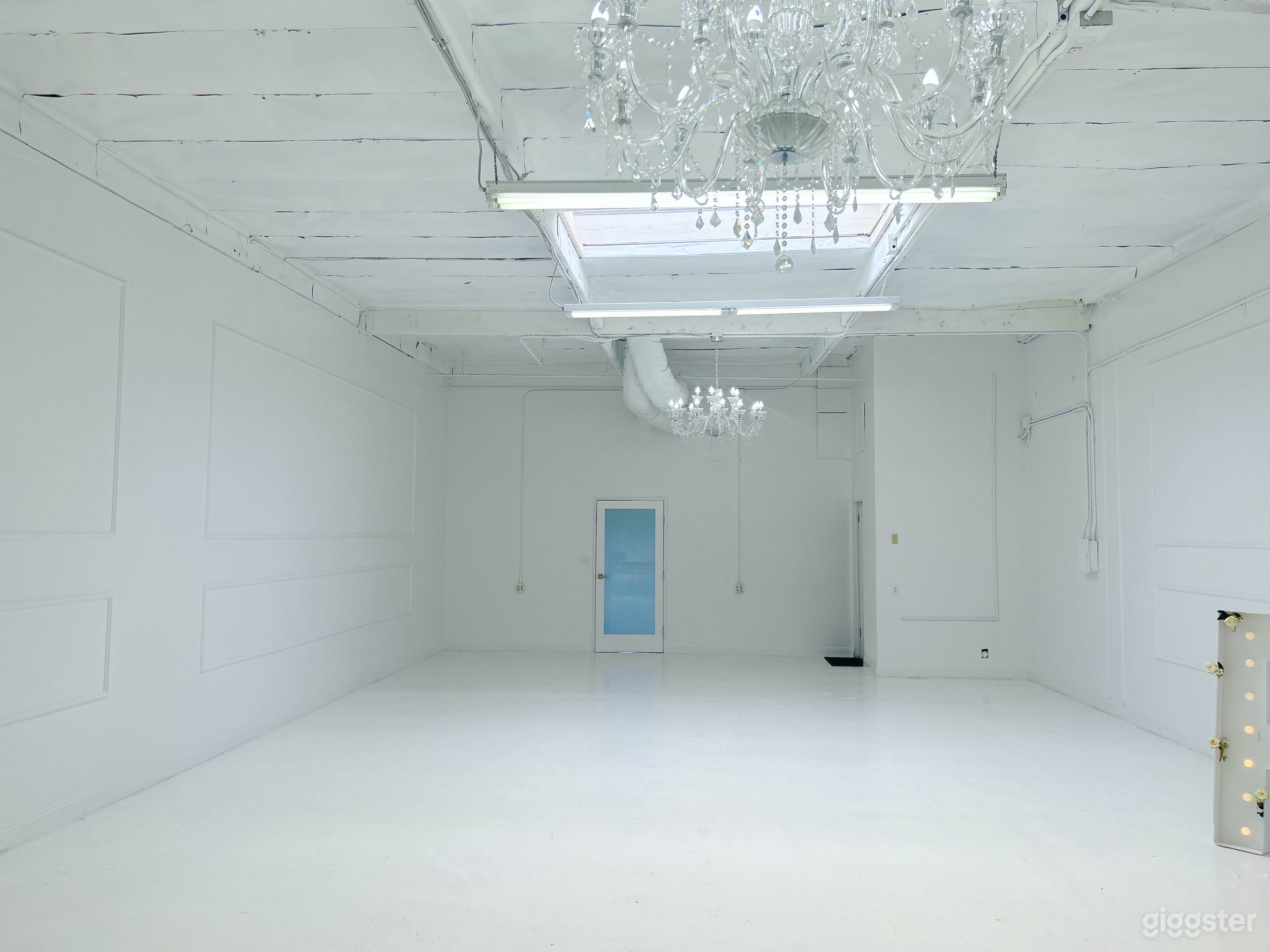 Frosted glass doors on entry to main room and bathroom.