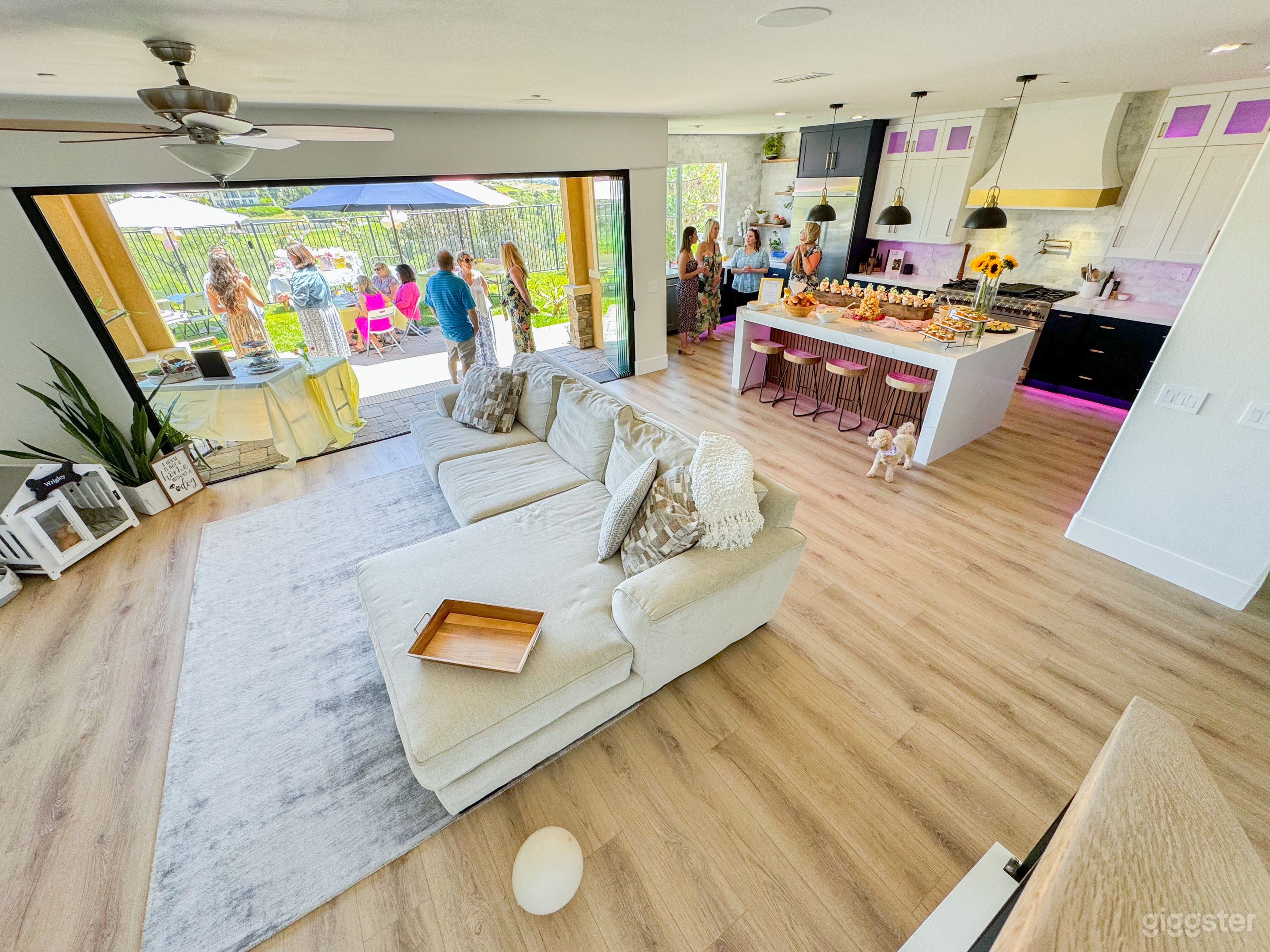 Large open space living area with 17ft bifold doors opening out to the backyard