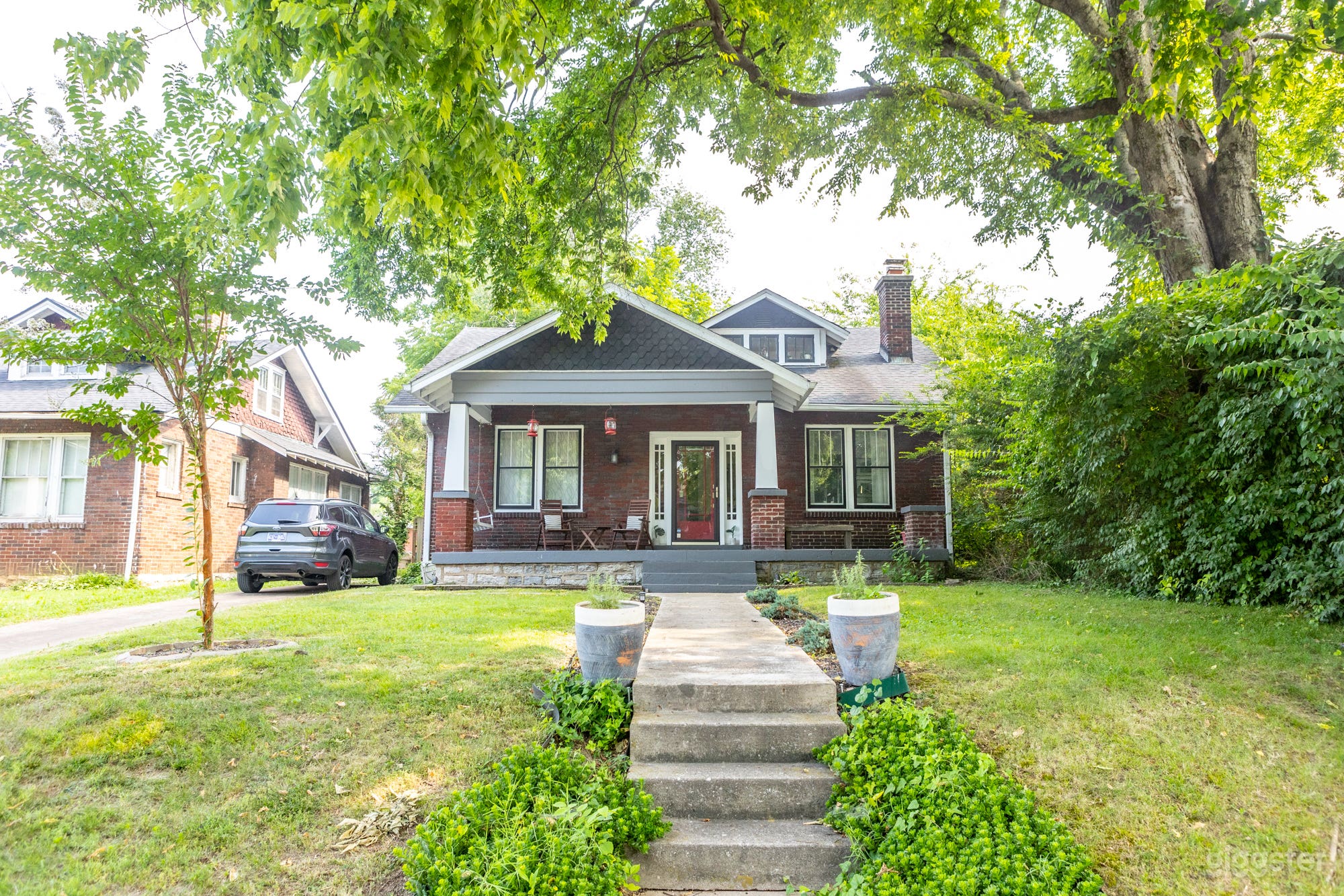 1925 Craftsman Bungalow - original brick, covered porch, porch swing