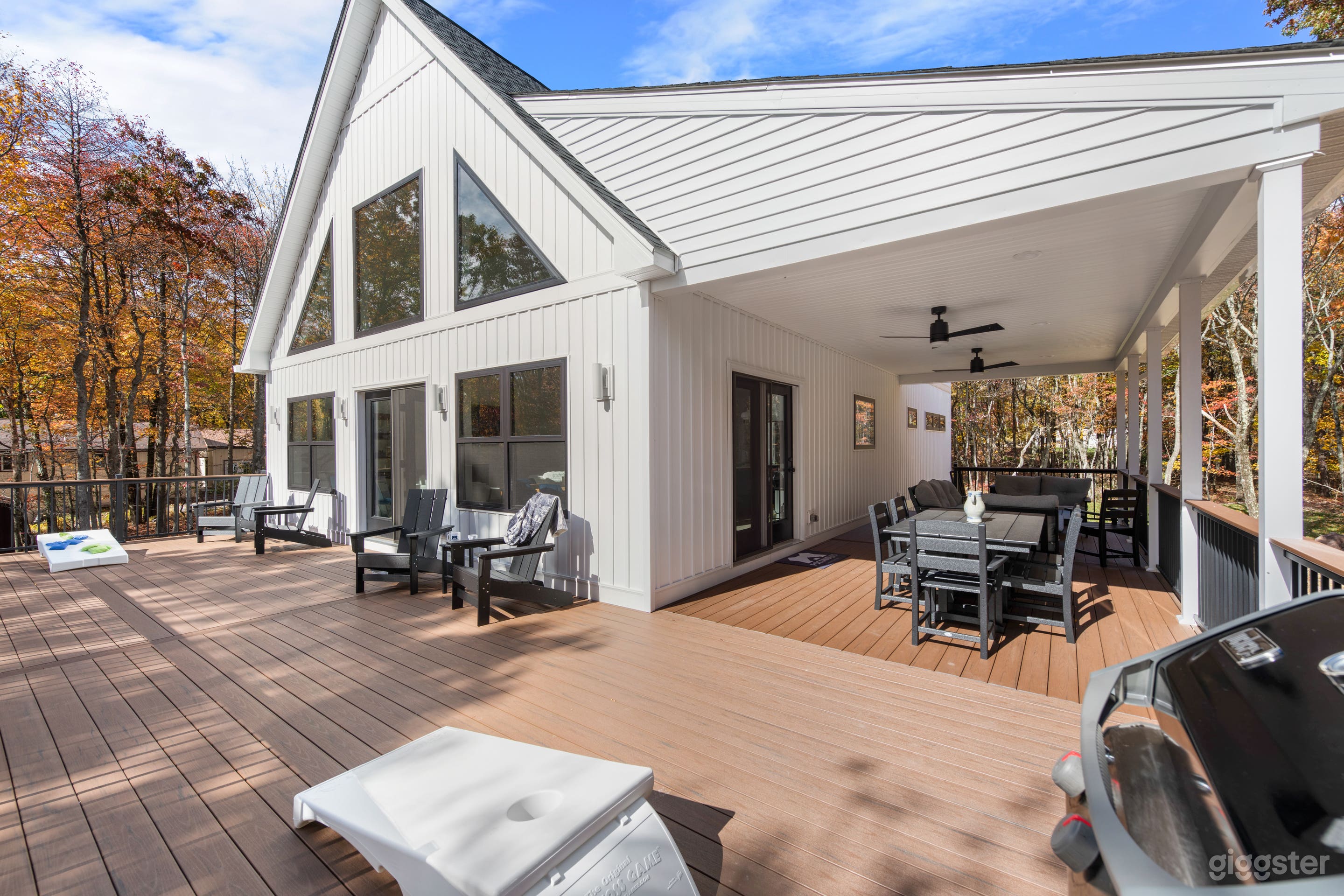 Large porch; half covered with fans.