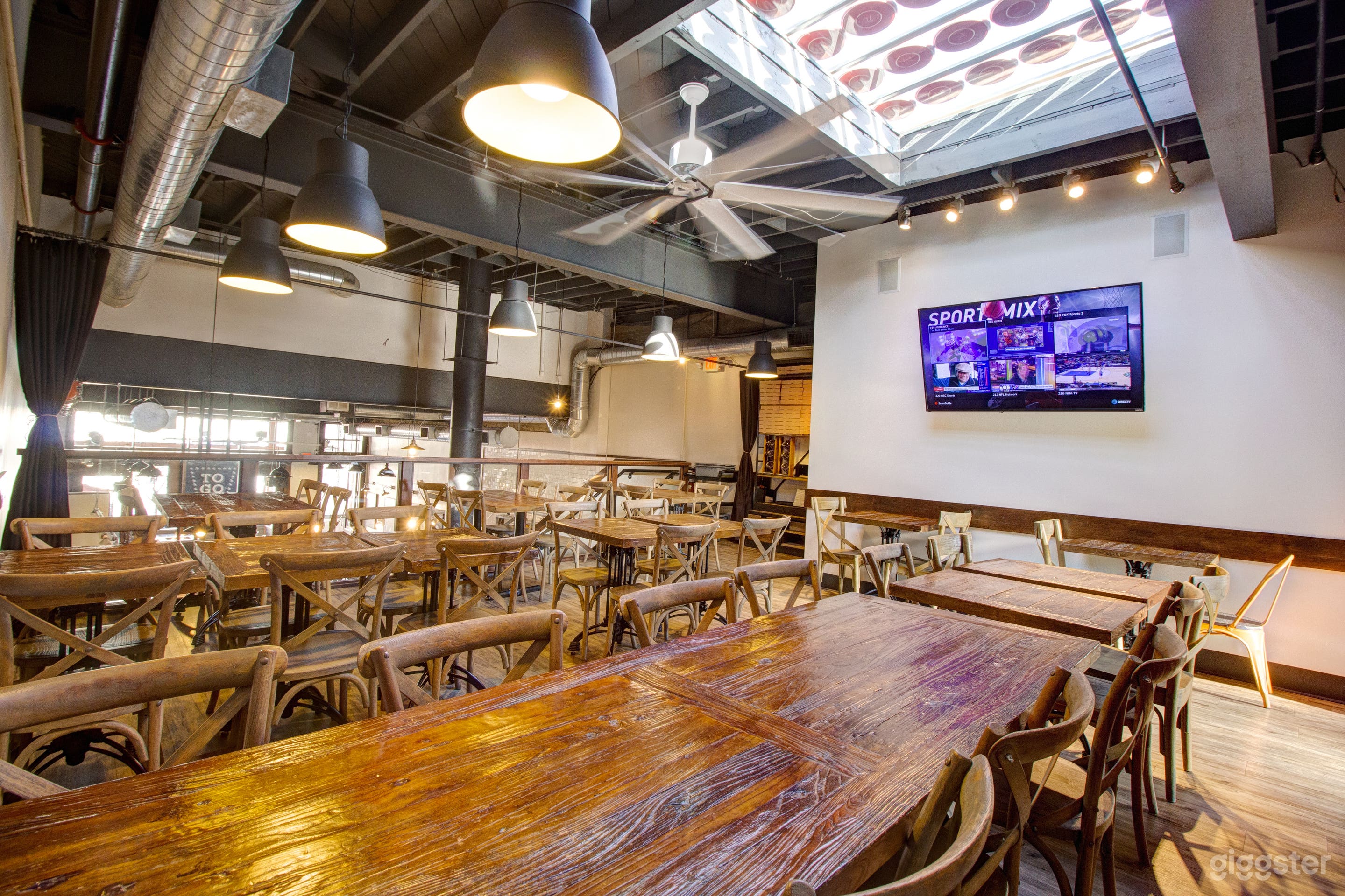 Retreat to our upper-level mezzanine overlooking the entire restaurant with a private "secret" room behind a sliding barn door available to you. Sound absorbing curtains can be drawn for further privacy.