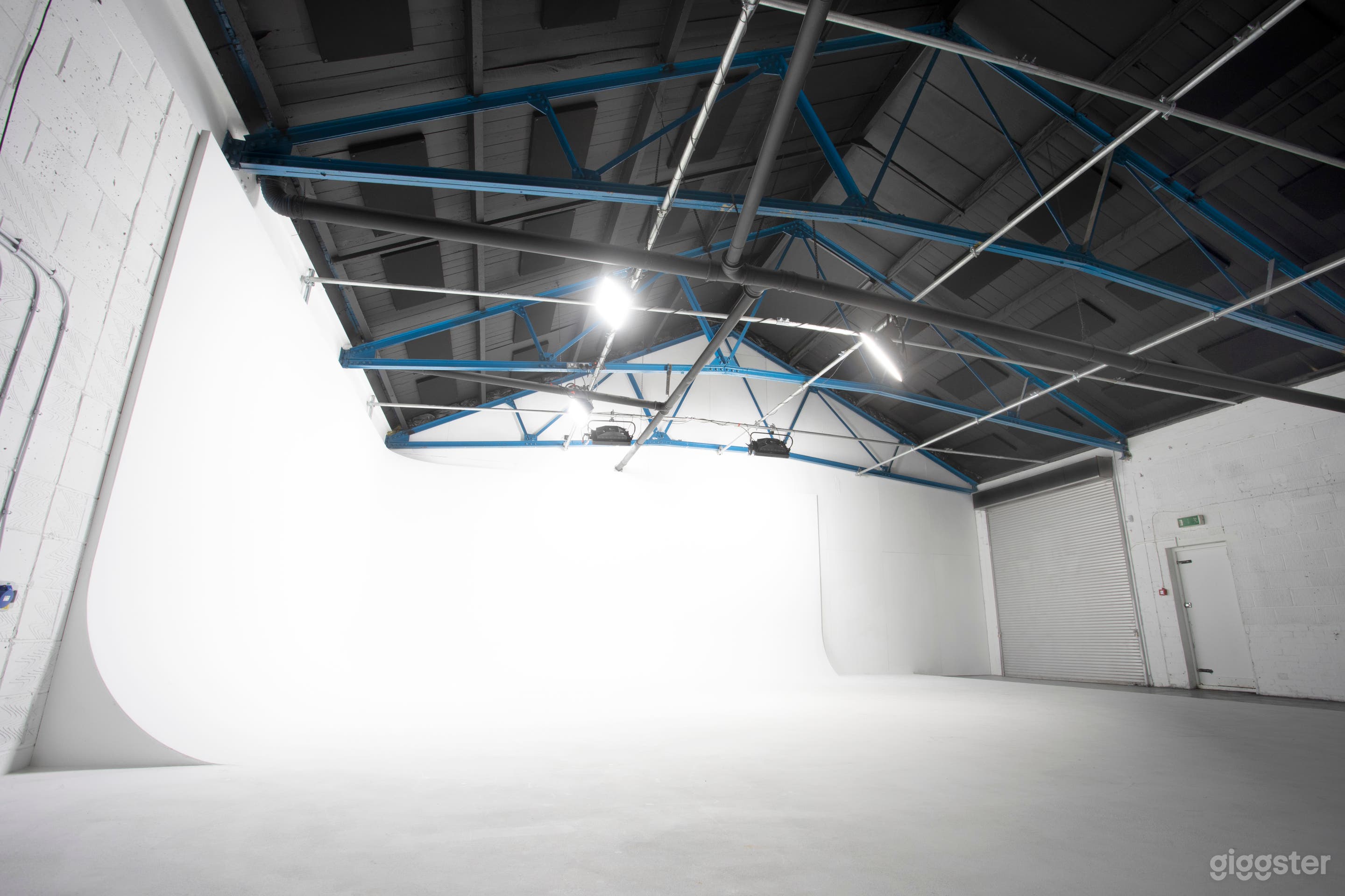 Infinity cove, showing roller shutter / drive-in access