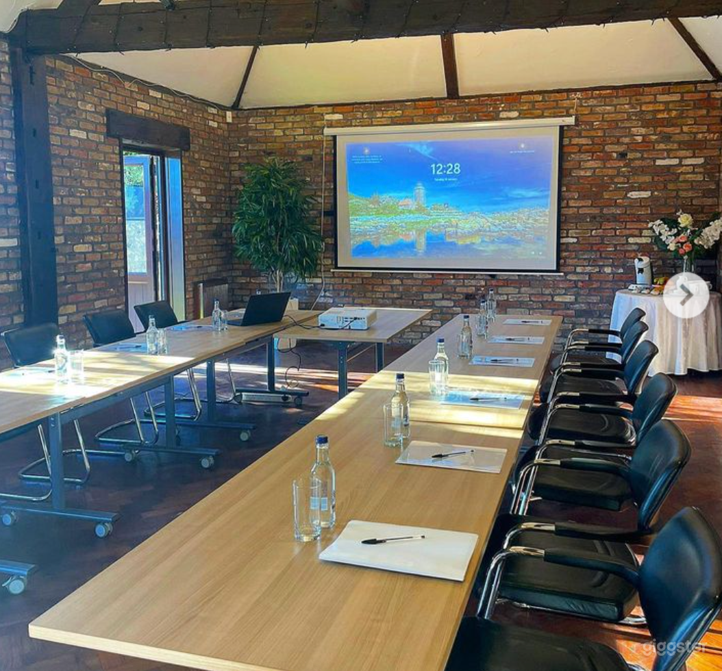 Ceremony Room with Timber Rafters Under a Tile Photo 2