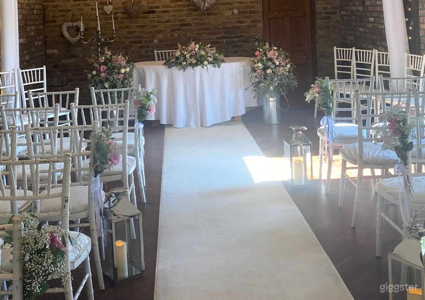 Ceremony Room with Timber Rafters Under a Tile Photo 4
