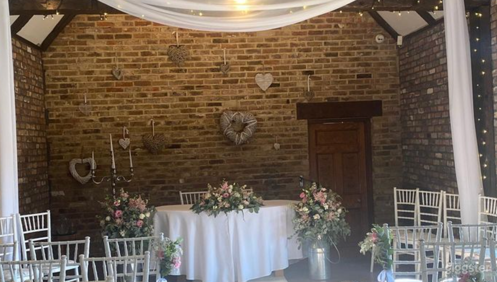 Ceremony Room with Timber Rafters Under a Tile Photo 3