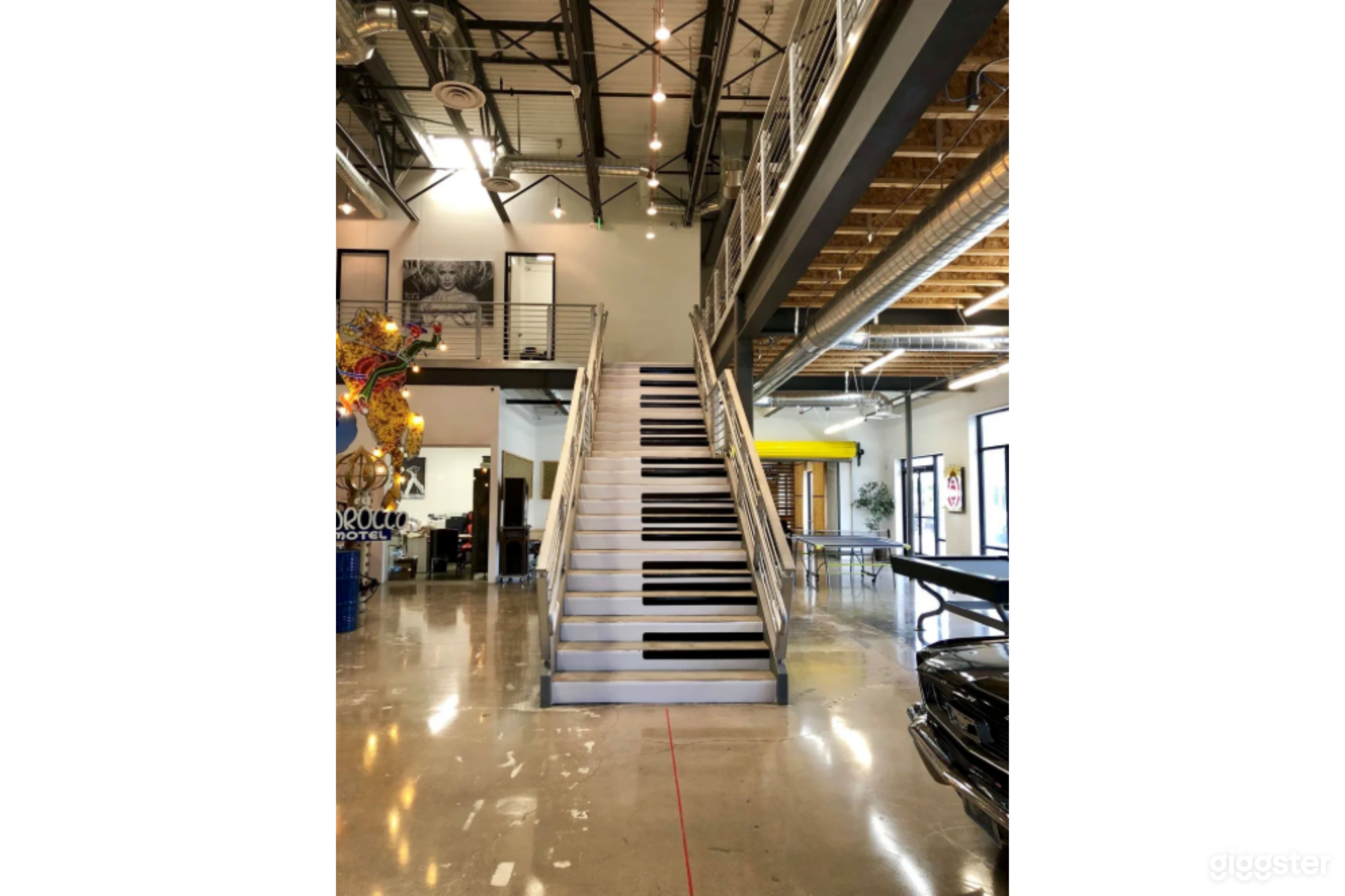 David Saxe Productions piano staircase and game room area.