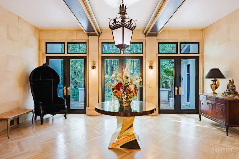  Foyer with access and views of forest and overlooking the stream 