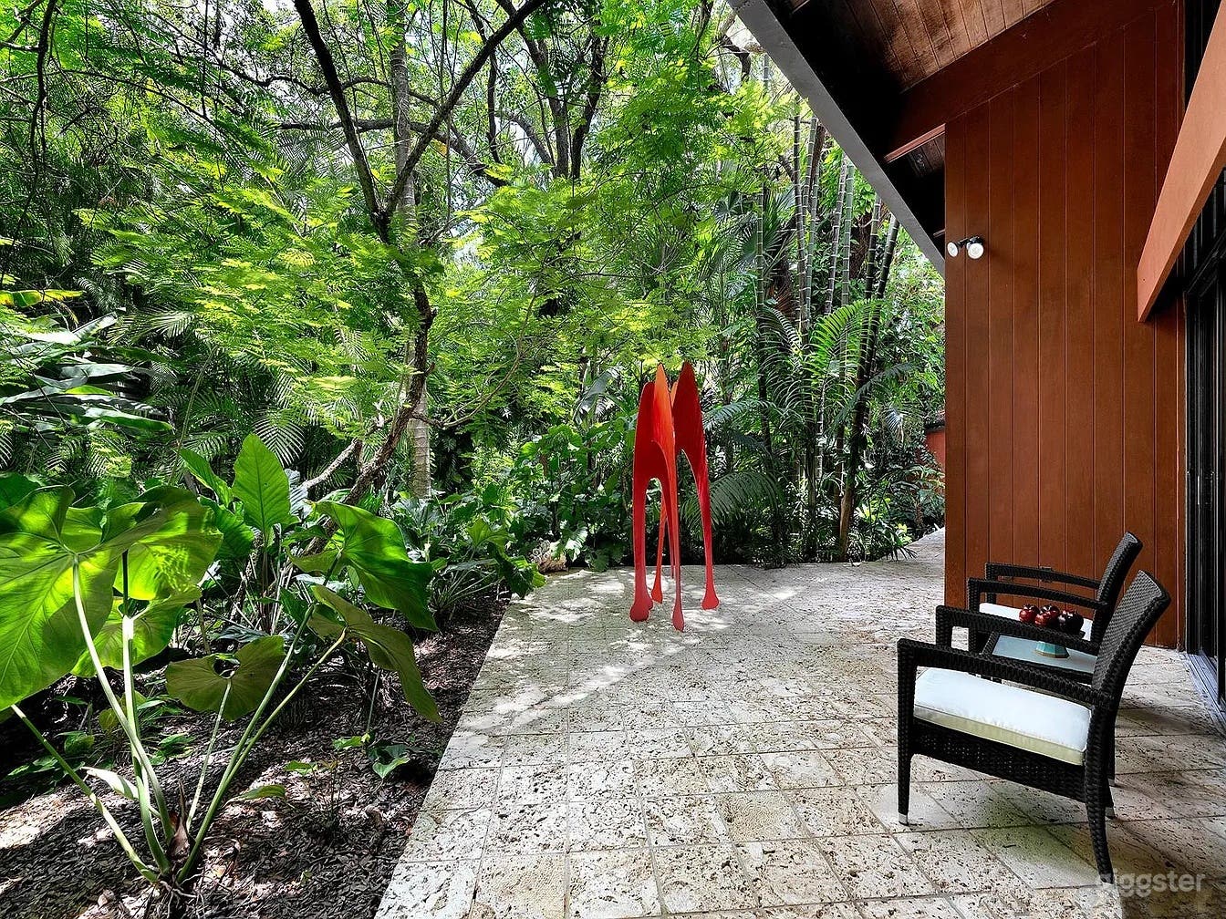 Tropical Freeform Pool with Coral Rock Grottos Photo 4