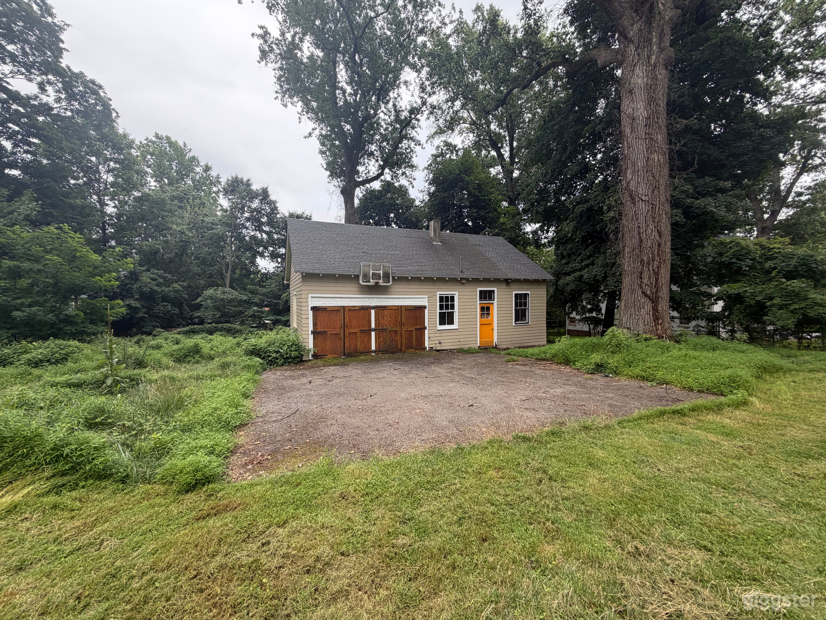 Rustic 19th Century Empty Carriage House Photo 1