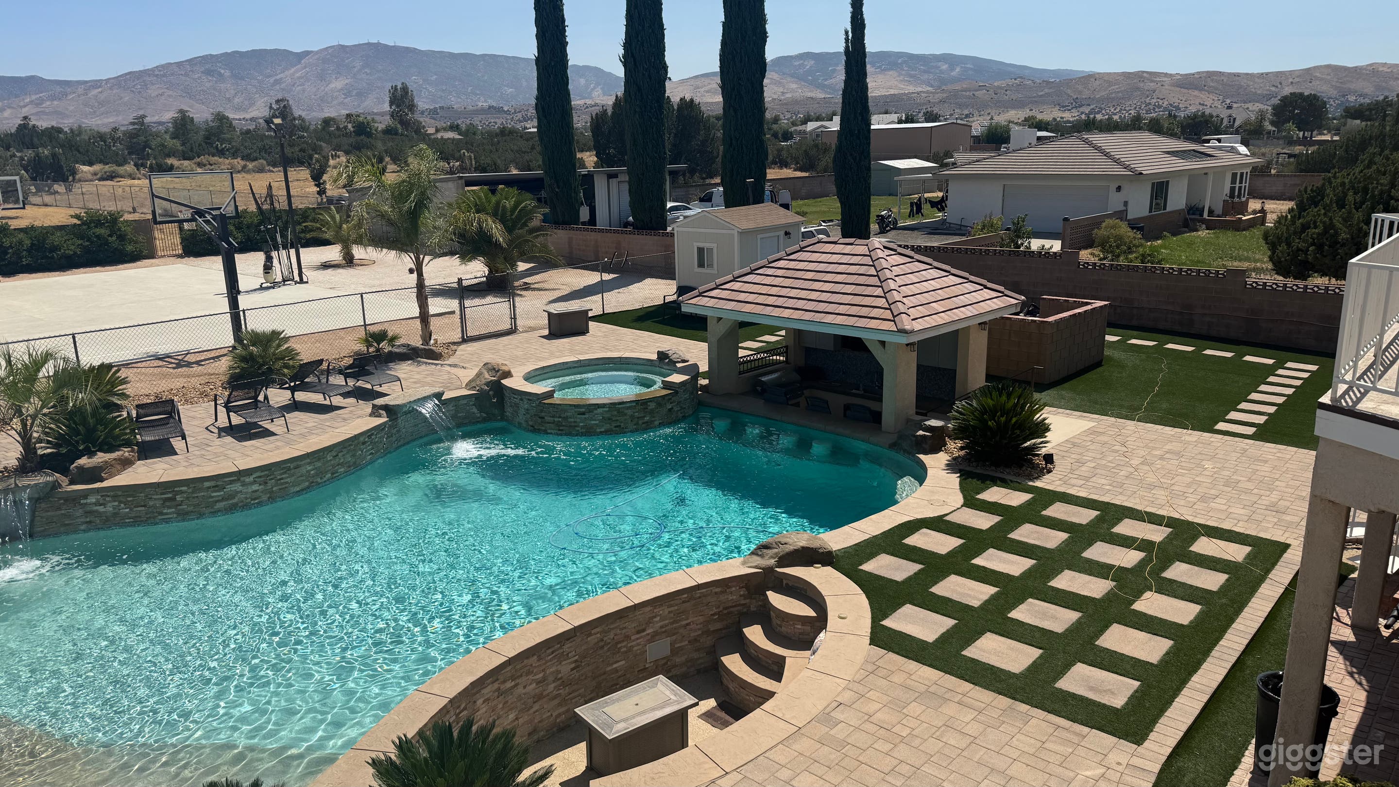 Resort-Style Backyard with Large Custom Heated Pool Photo 1
