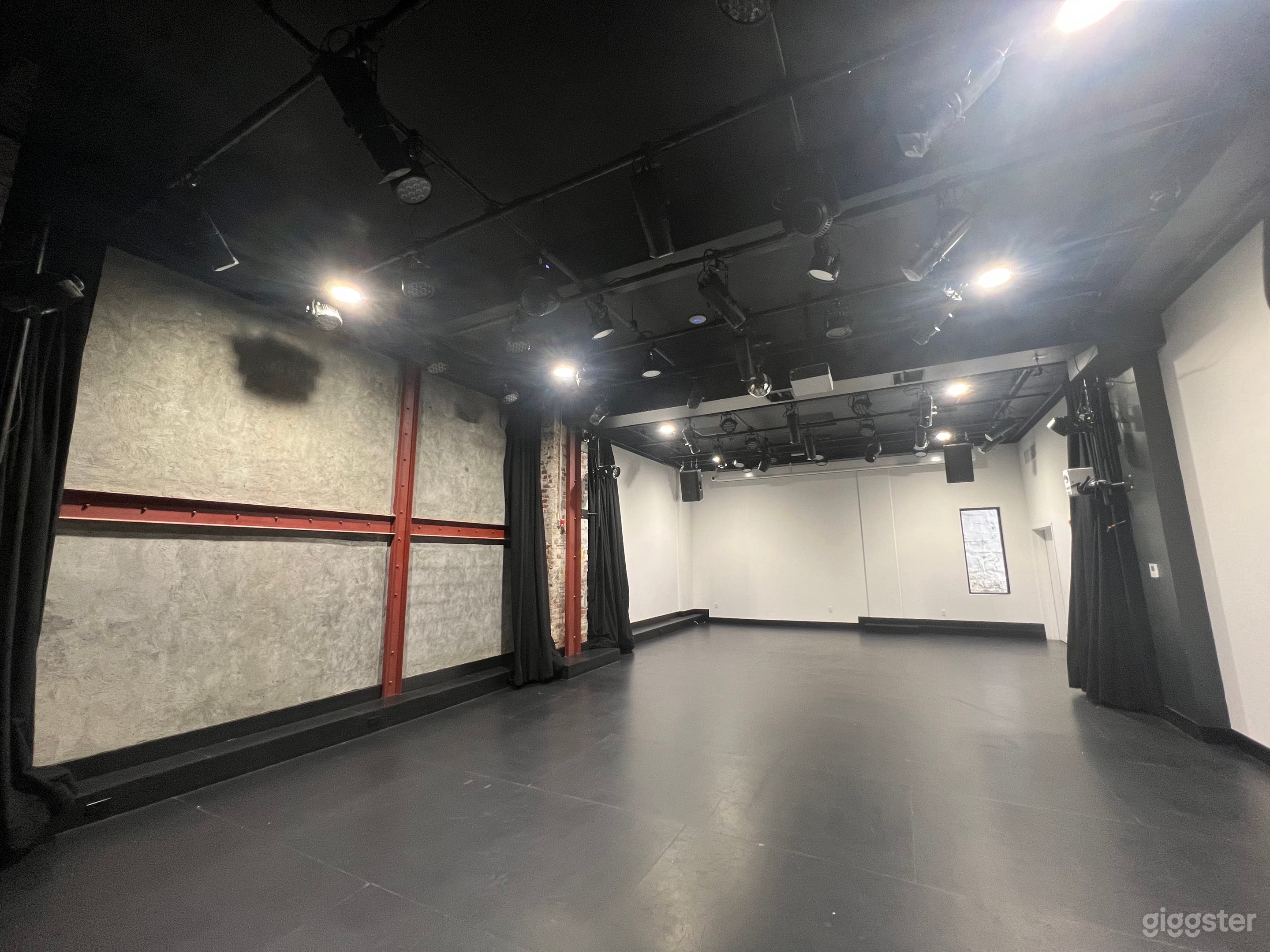 This is our Main Theater space. At 1,200 sq ft, this space is designed as flex stage. It has a 16' projector screen and a state of the light and sound system.