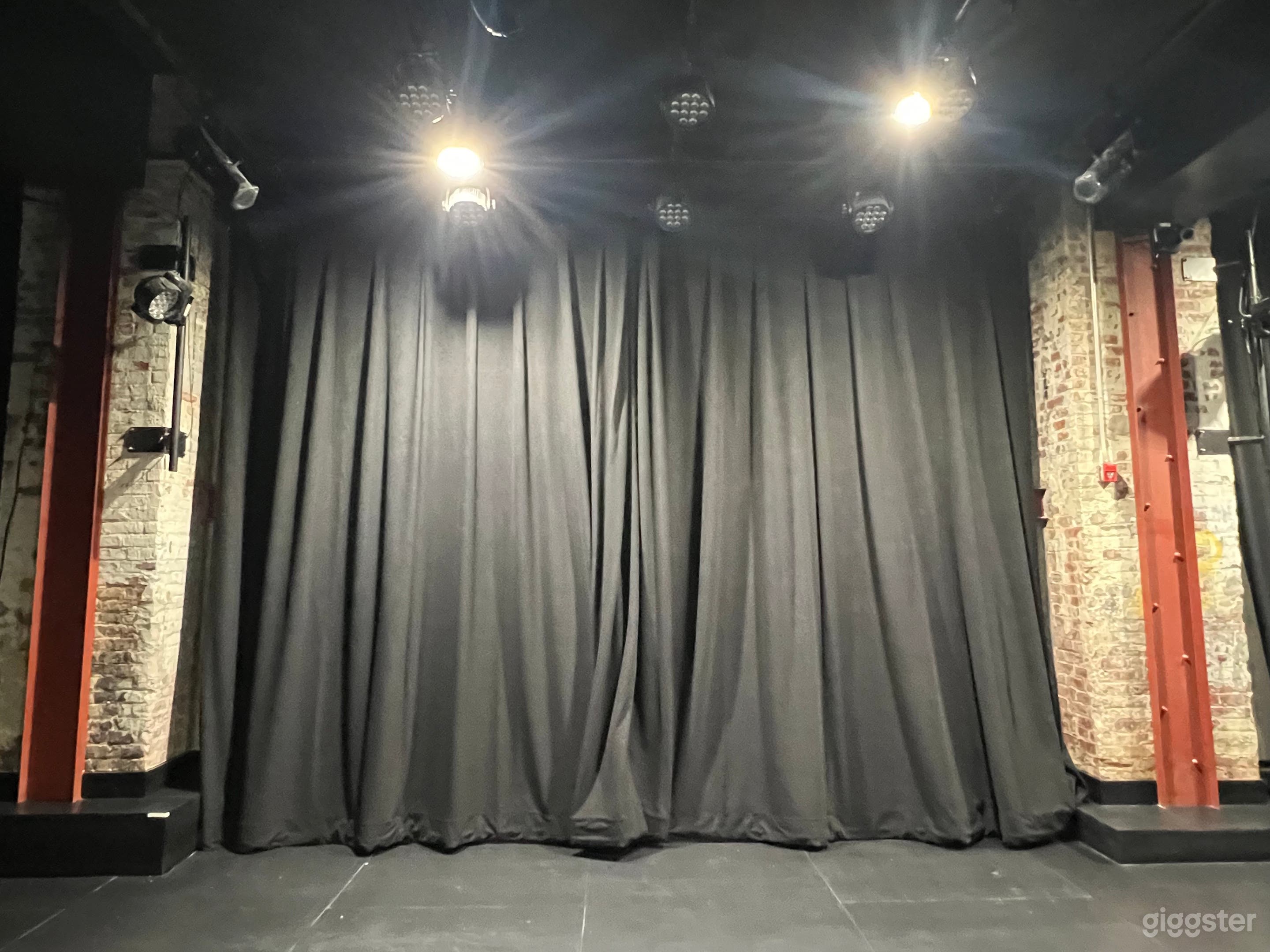 This is our Main Theater space. At 1,200 sq ft, this space is designed as flex stage. It has a 16' projector screen and a state of the light and sound system.