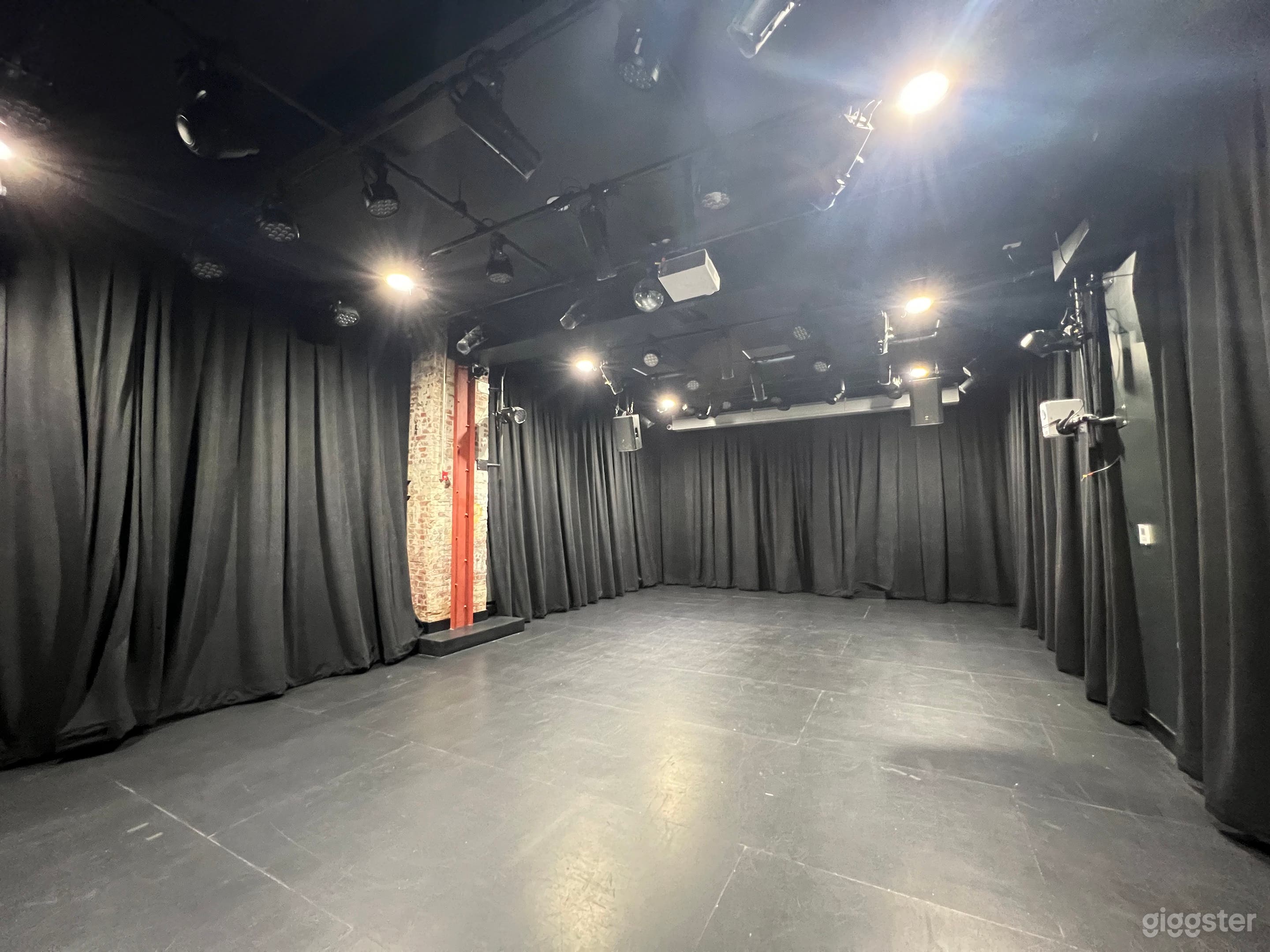This is our Main Theater space. At 1,200 sq ft, this space is designed as flex stage. It has a 16' projector screen and a state of the light and sound system.