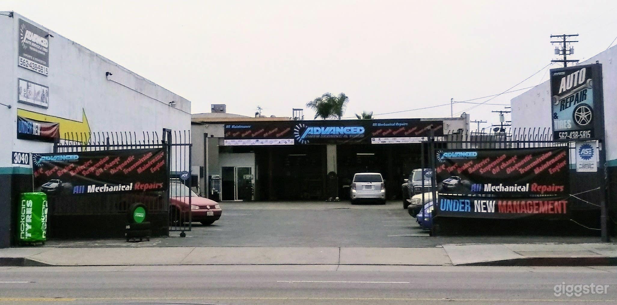 Shop front with gated parking lot