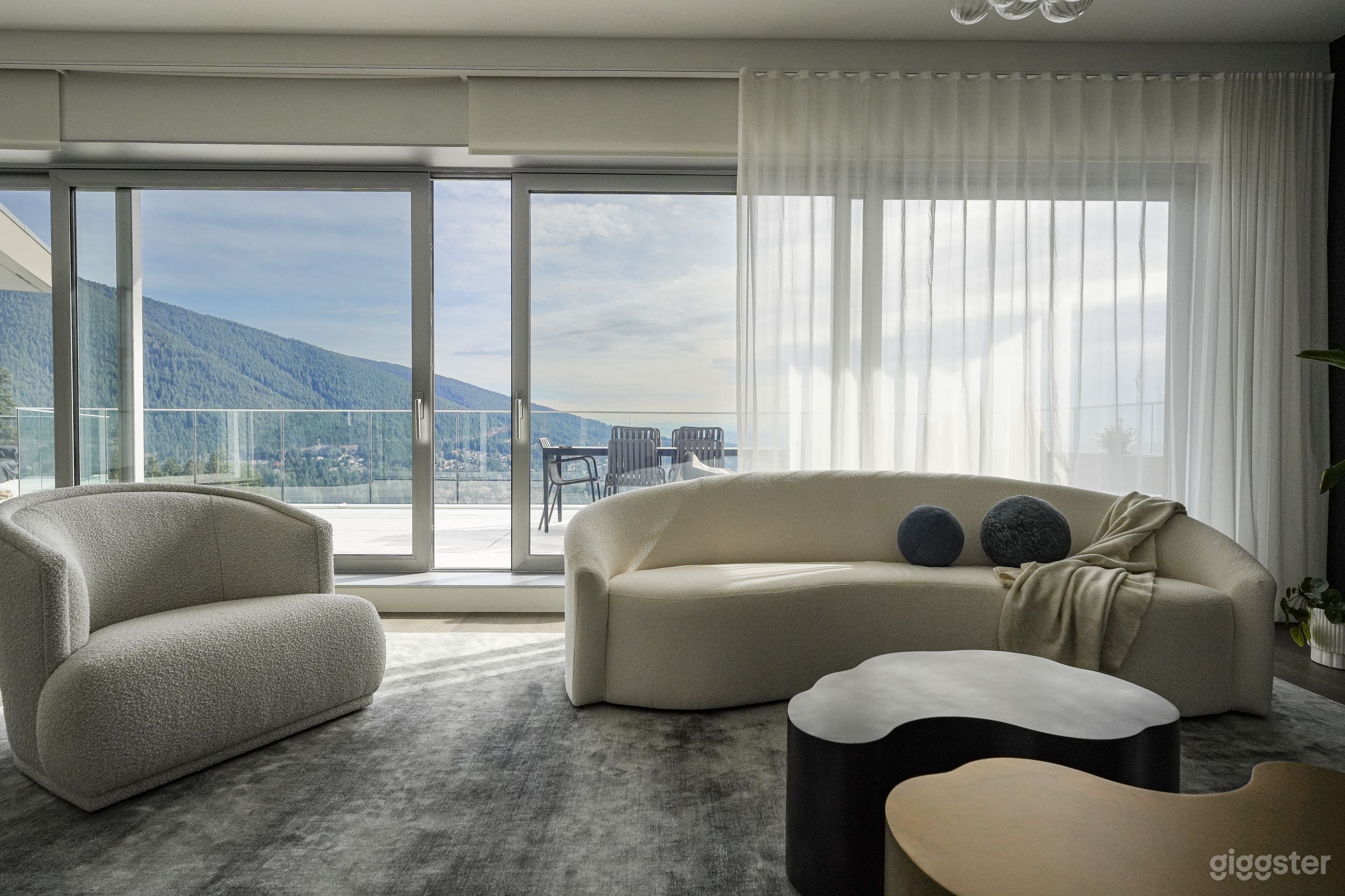 Modern House with Mountain, Water, and City Views Photo 2