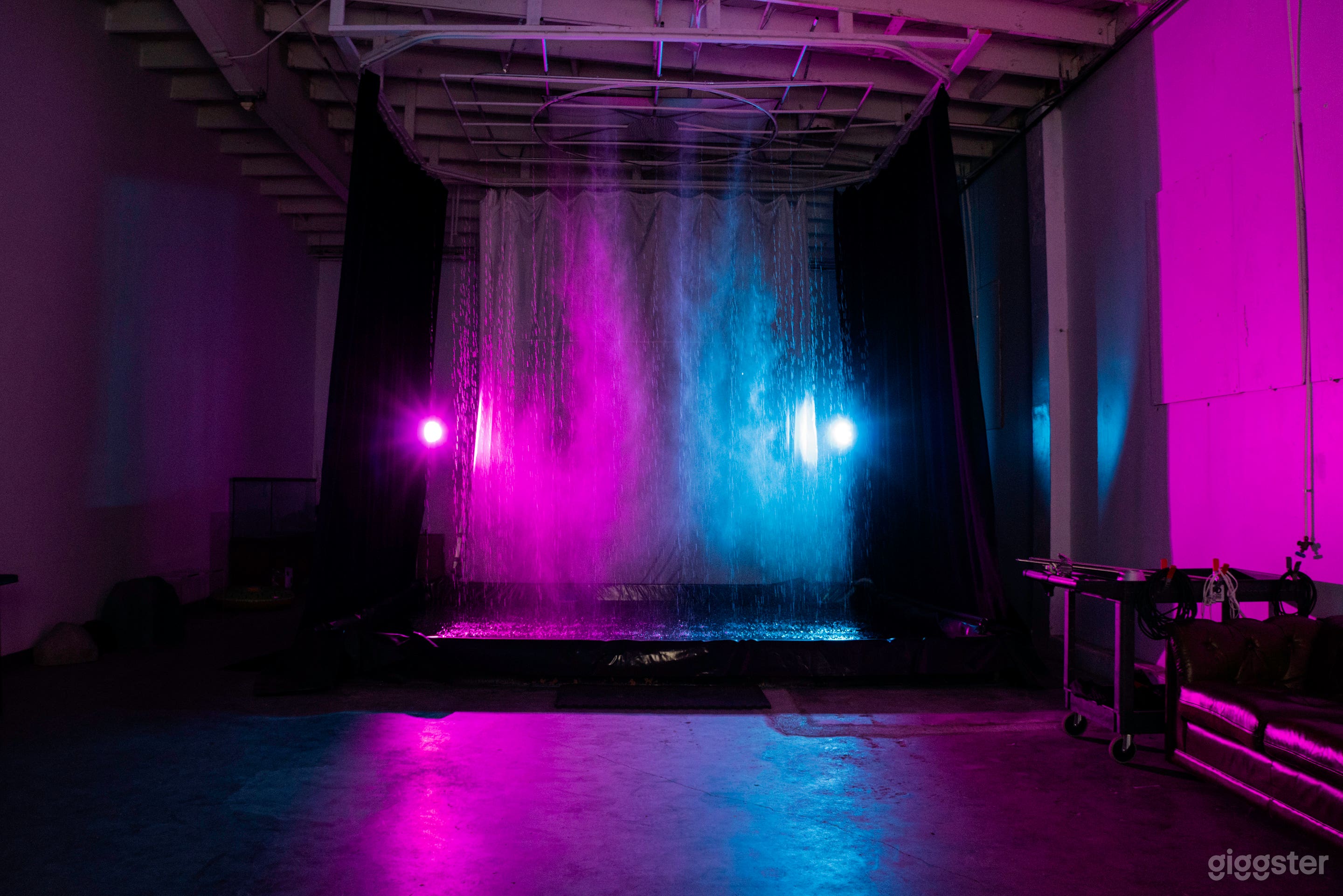 Photo studio with a pool filled with water and rain feature Photo 1