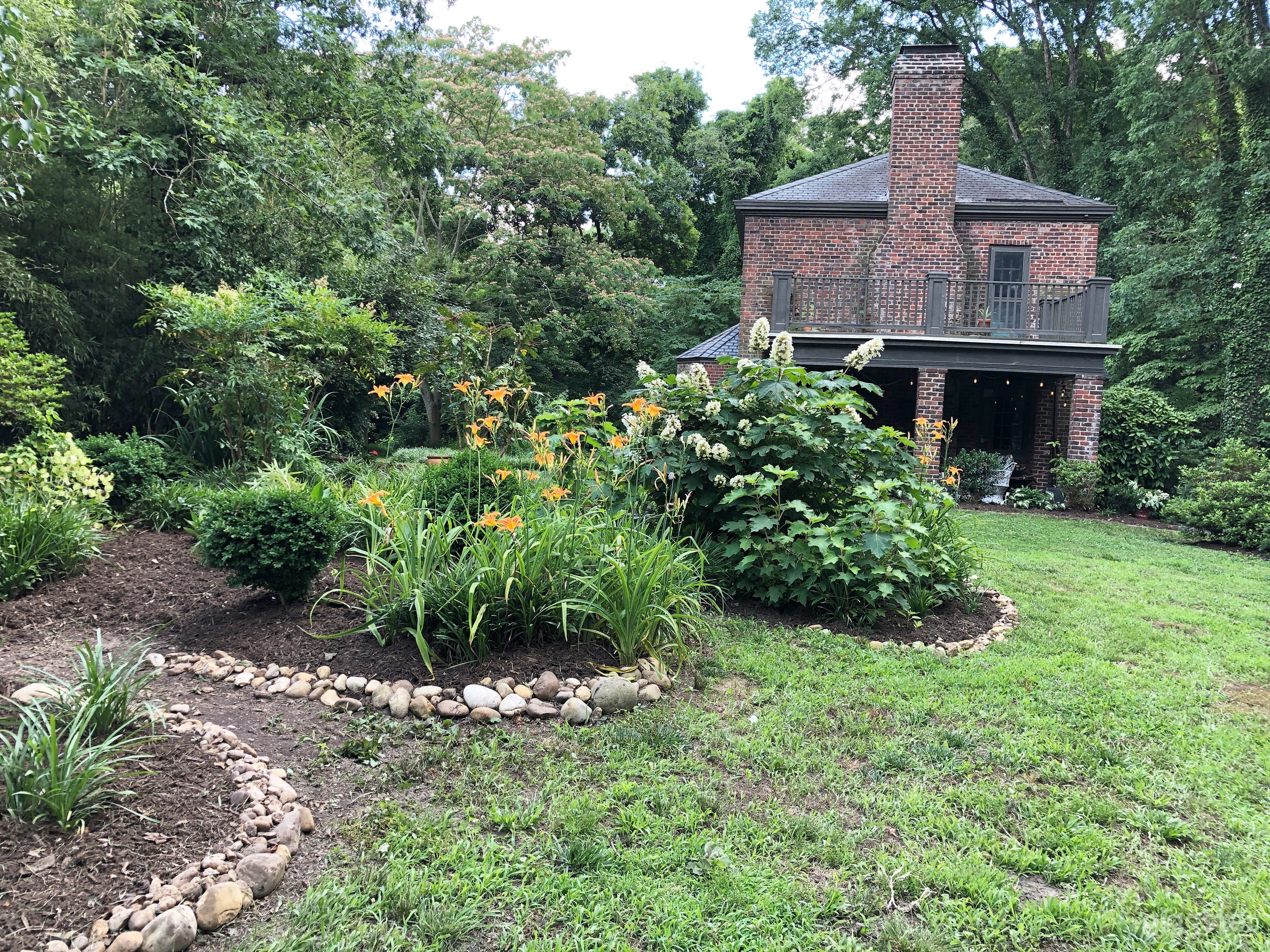 Garden side of the house and yard