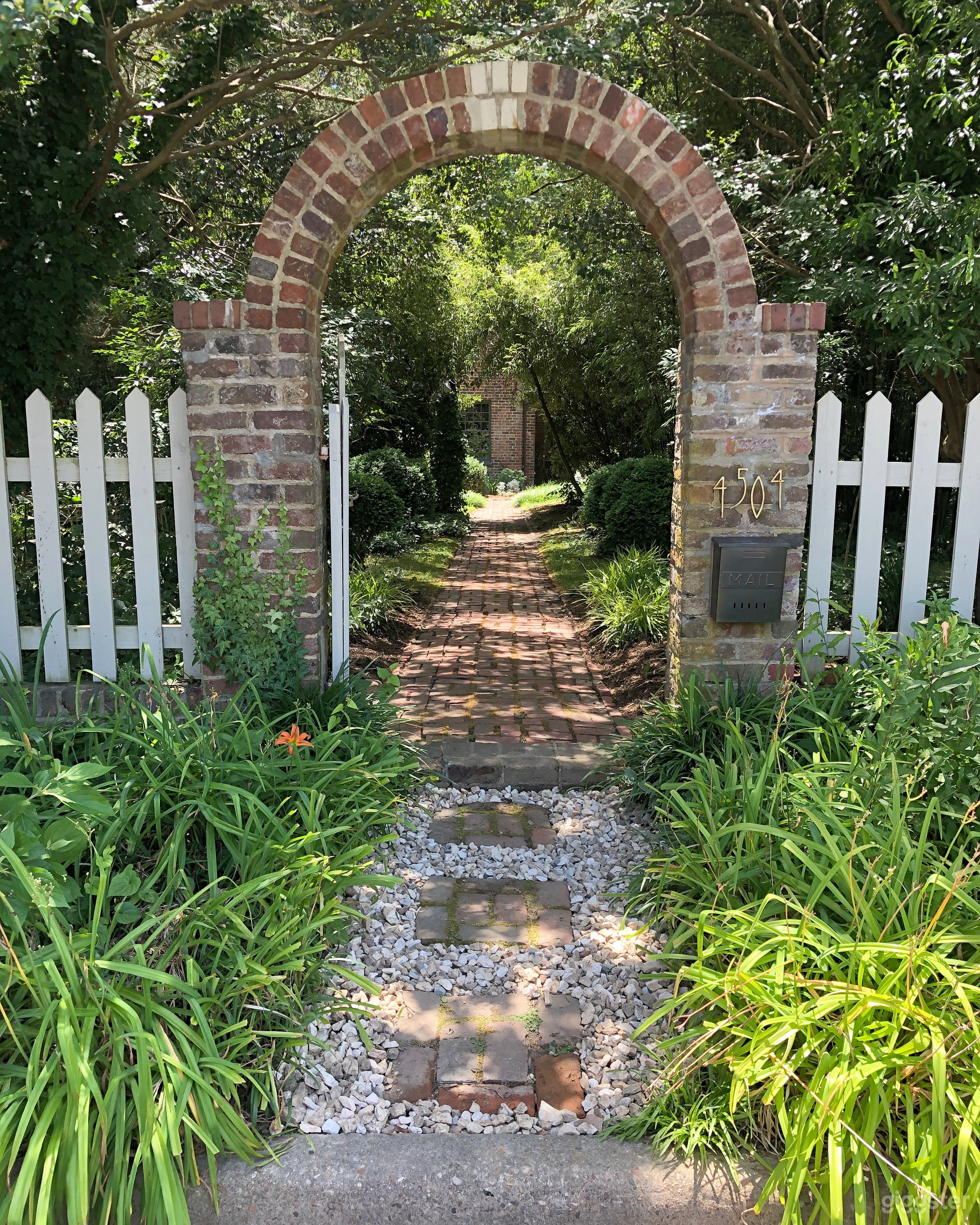 Front entrance with arched gate