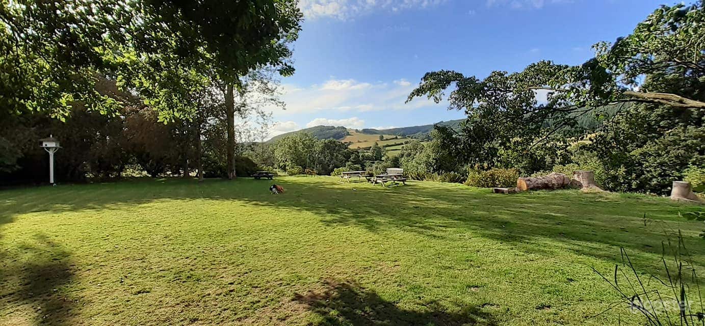 Large flat lawn with stunning views across to Shropshire