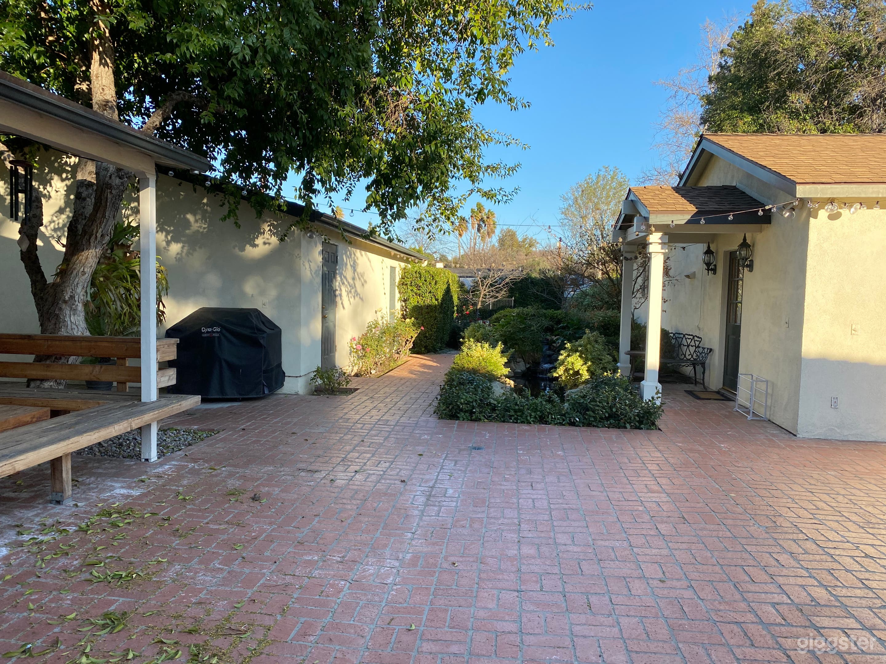 Koi pond located in between the garage &amp; guesthouse entrance...