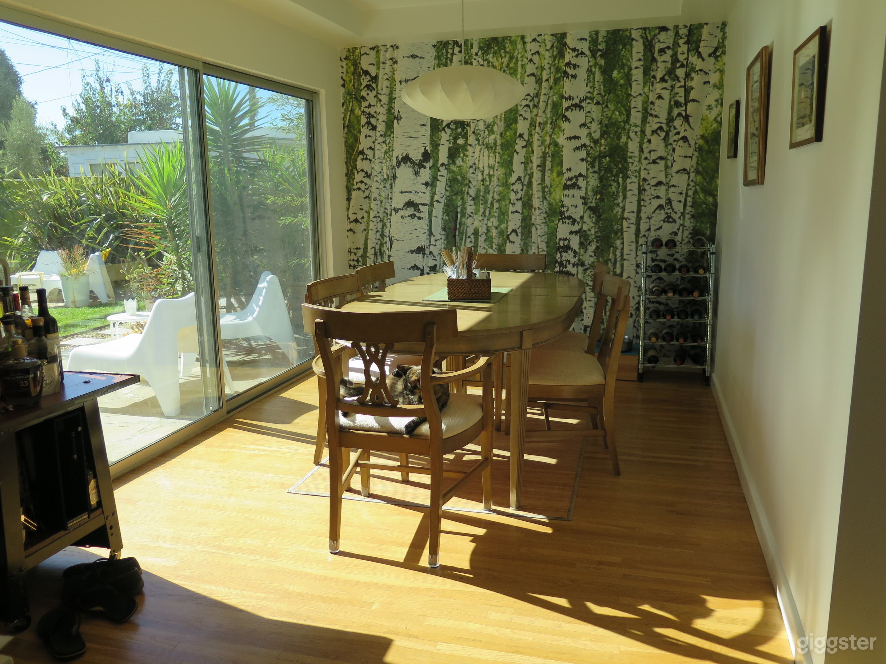 Sunlight filled dining room.