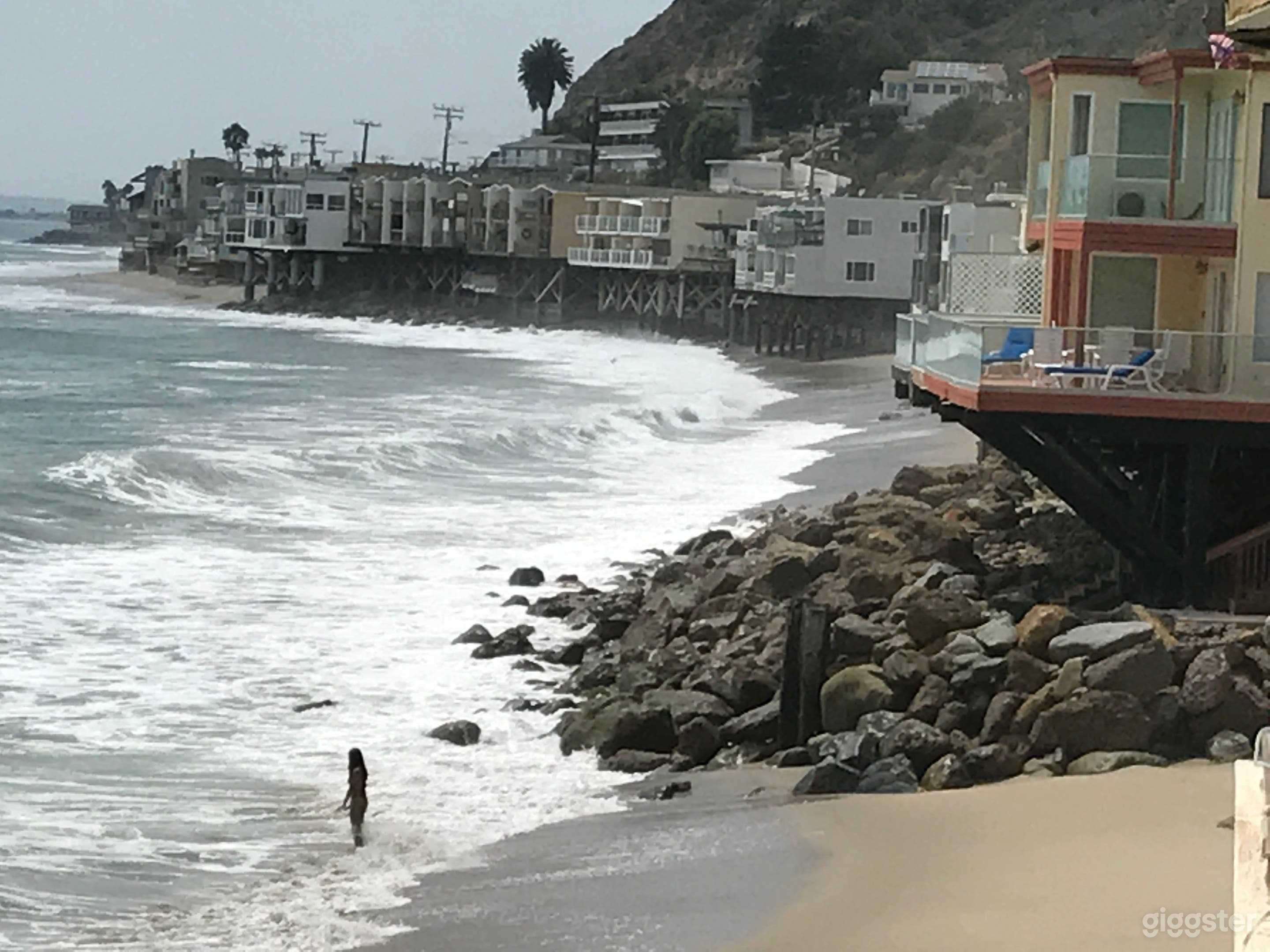 View of private beach from middle deck of house.