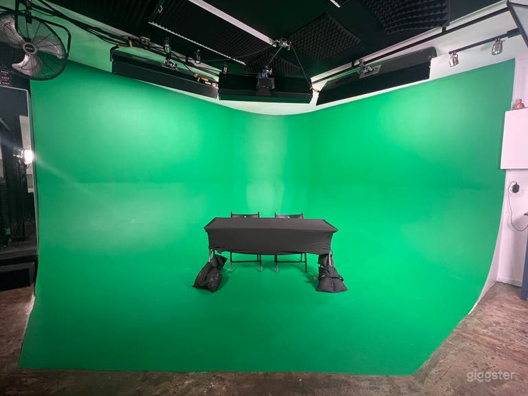  Table with Black Tablecloth and Chairs available 