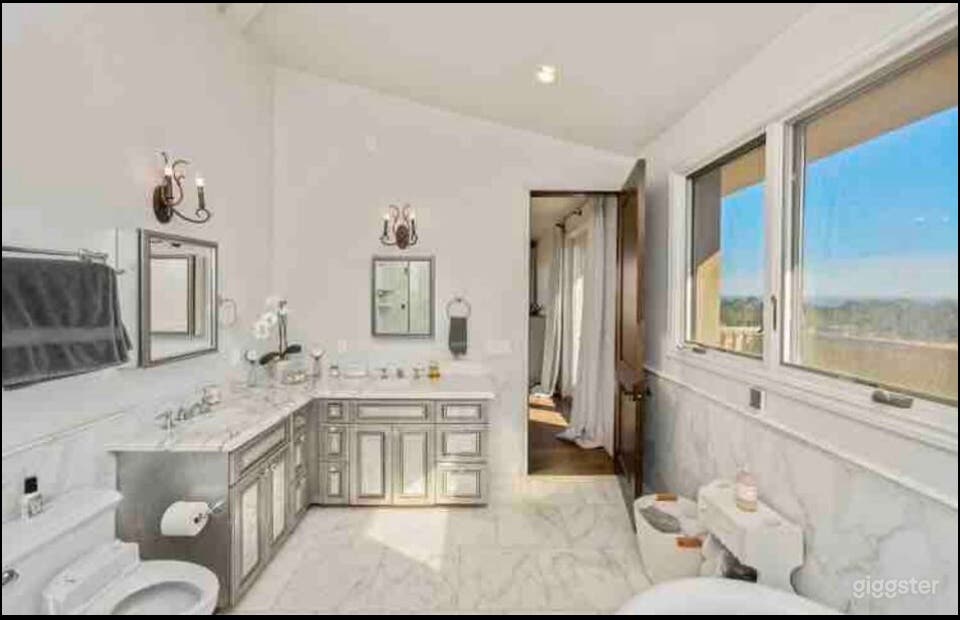 Master bath with marble and claw tub