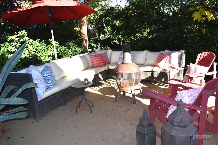  One of two backyard 
lounges with fire pit and adirondeck rocking chairs 