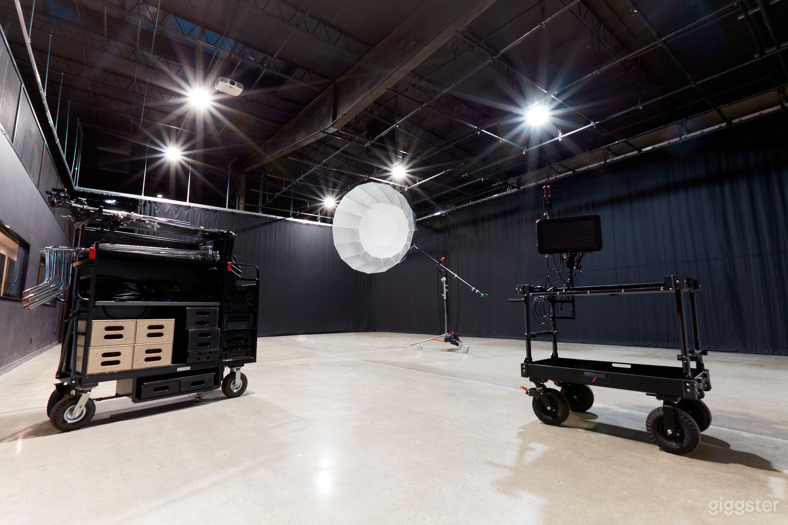 Massive Stage Floor with 360 degree Blackout Curtains - Big Enough to Hold any size set you can imagine. We have photo and video gear rental packages available for any type of shoot.