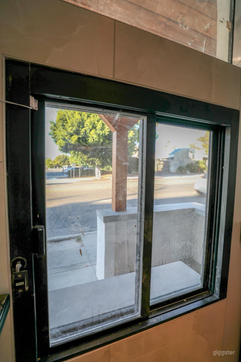  Transaction window from inside, with air curtain. 