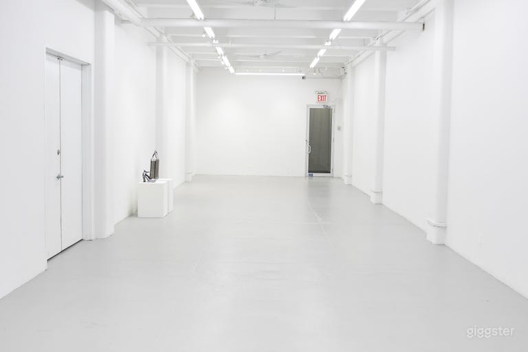  Facing the tall glass door. Note the double door entrance to the left.  