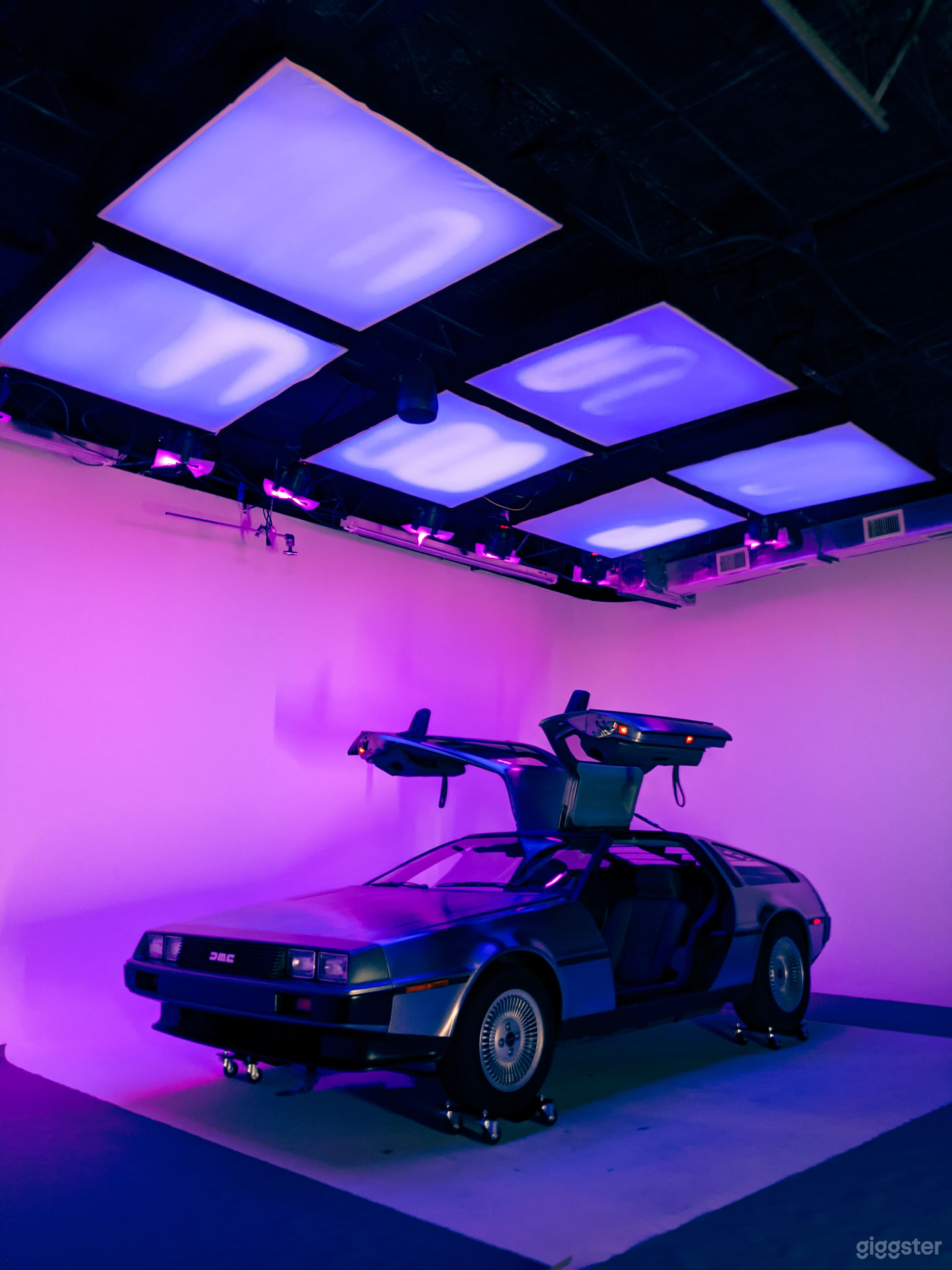 DeLorean on vehicle dollies on our cyc floor getting positioned for a shoot.