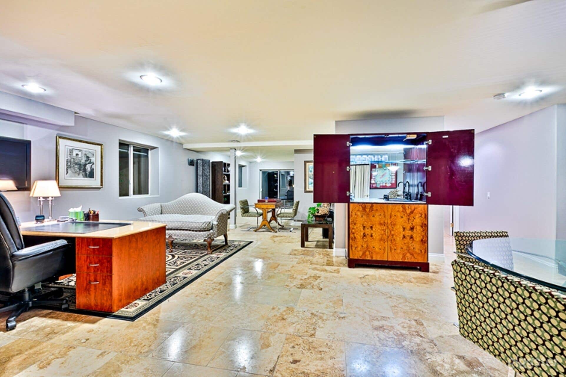 Theatre level Office, Wet Bar and Game area