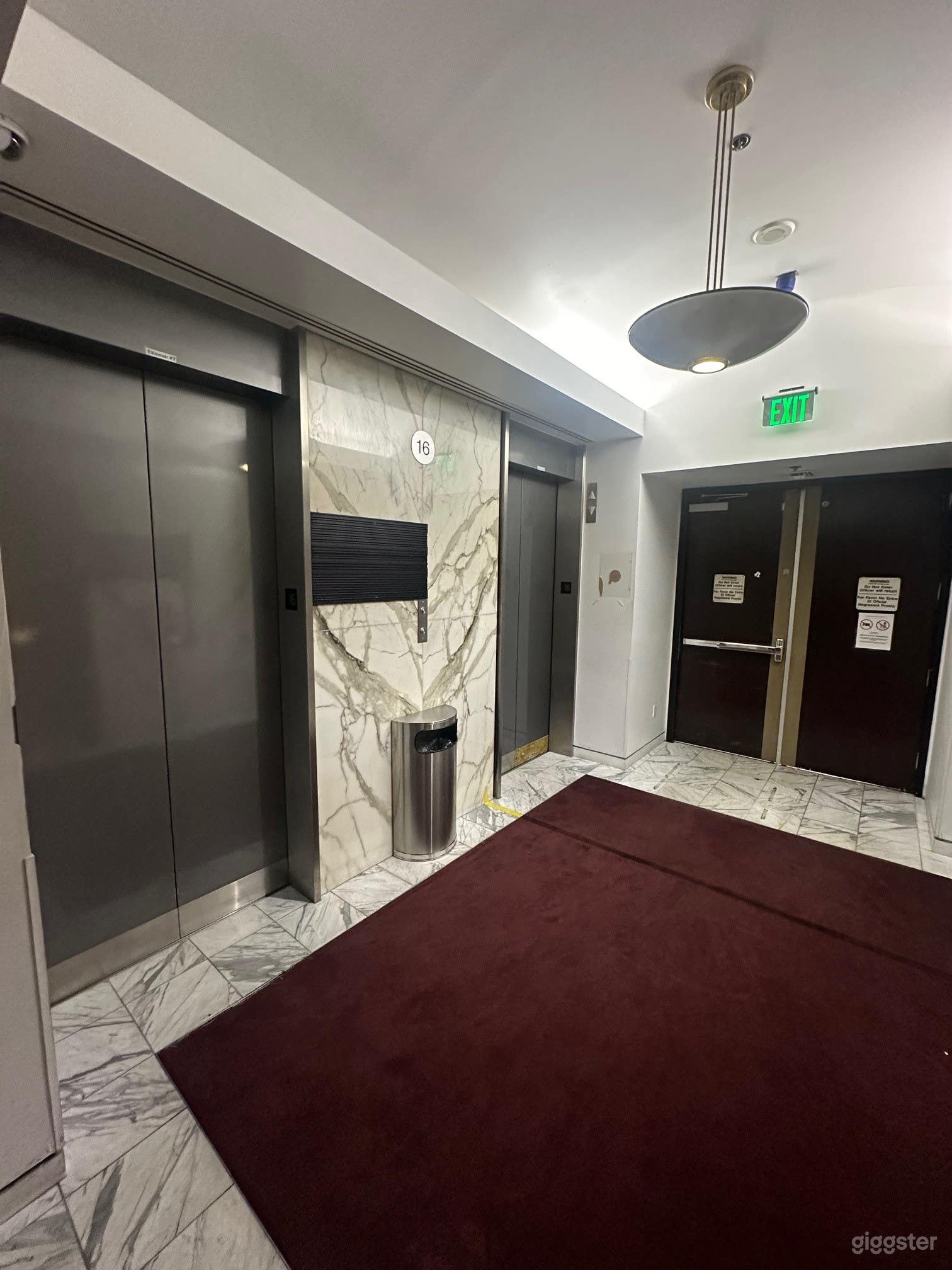 Spacious Vacated Courtroom with Long Hallways Photo 3