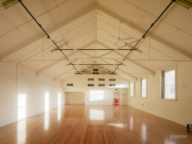  UPSTAIRS STUDIO

9.5m x 14m / 133m2 / 100p Capacity

Upstairs Studio is a large, vaulted timber floor studio space with natural light and bleachers at one end of the space. 